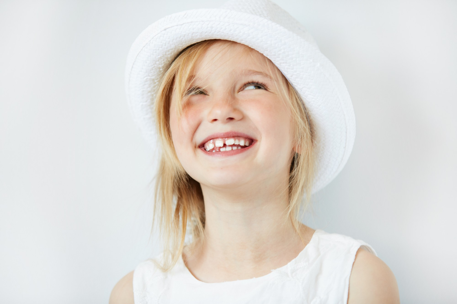 A young girl smiling | Source: Freepik