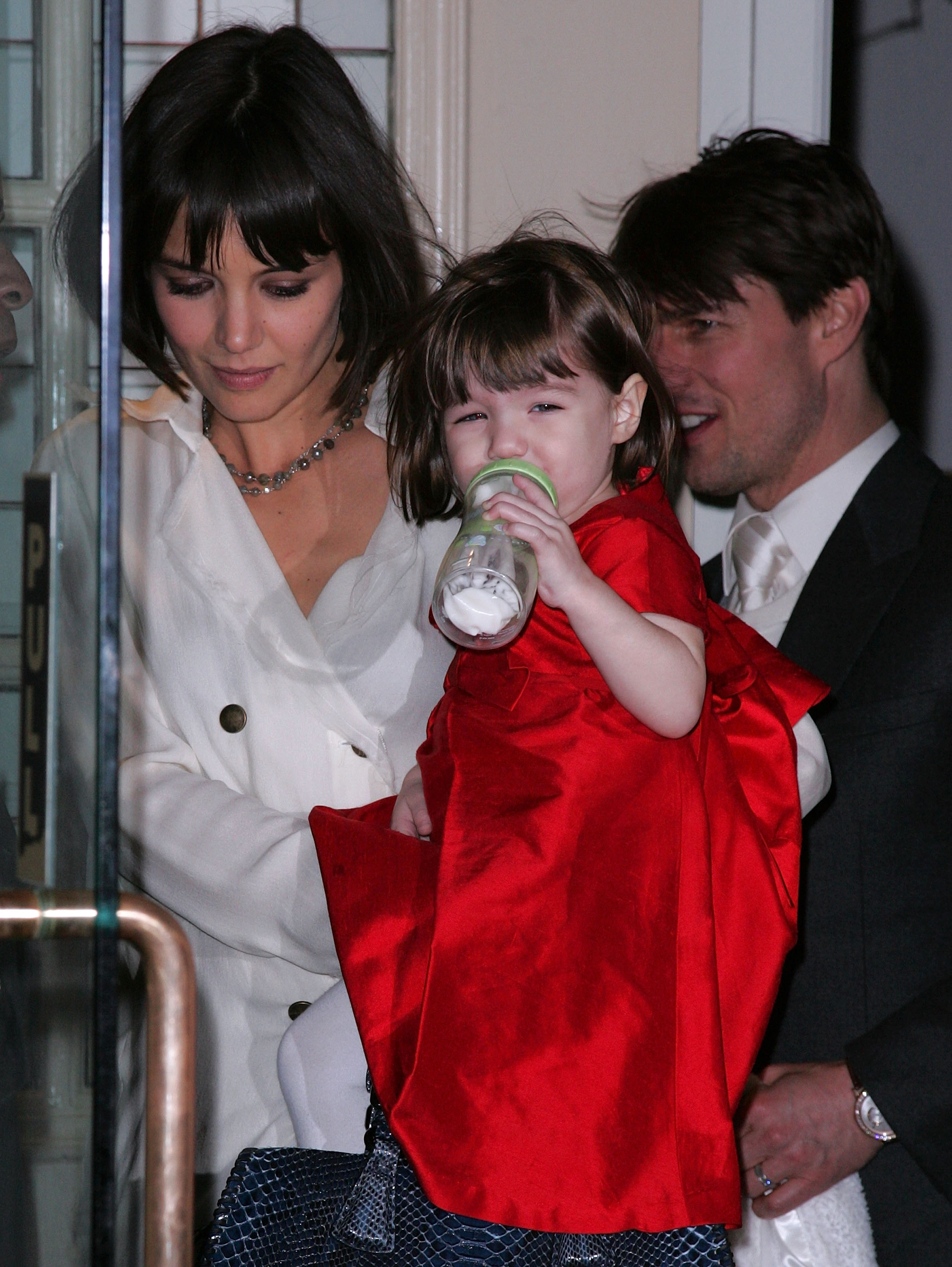 Katie Holmes with Suri and Tom Cruise in New York on January 14, 2008. | Source: Getty Images