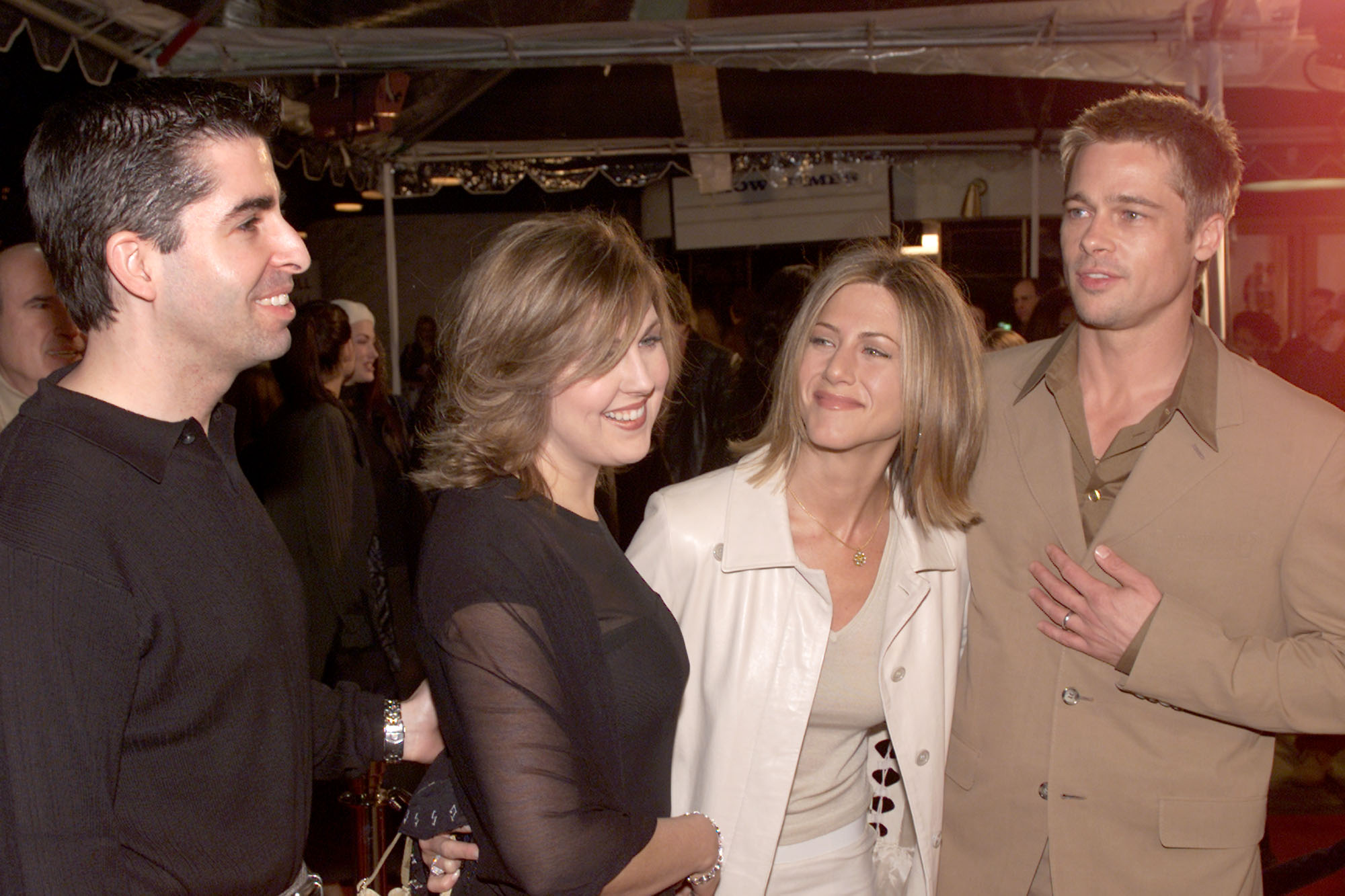 Brad Pitt and actress Jennifer Aniston, with Brad's sister Julie and her husband Rob attending a premiere on February 23, 2001 | Source: Getty Images