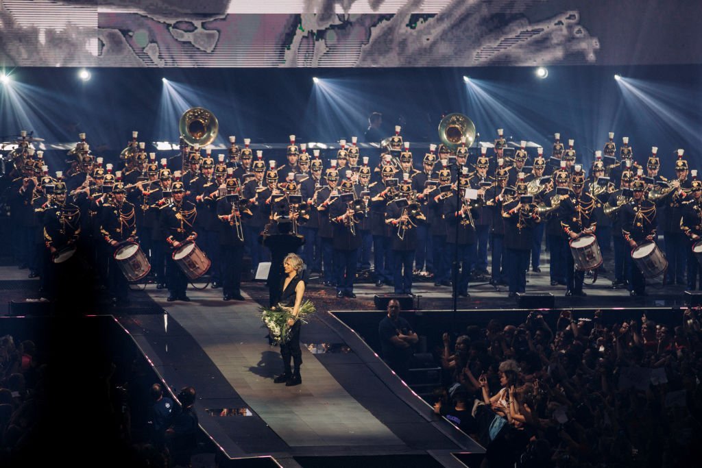 Le groupe pop rock Indochine en tournée au stade Pierre-Mauroy de Lille le 22 juin 2019. | Photo : Getty Images.