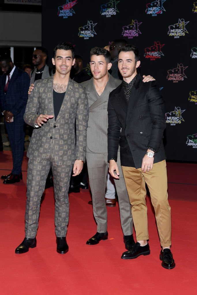 Joe Jonas, Nick Jonas and Kevin Jonas attend the 21st NRJ Music Awards at Palais des Festivals | Getty Images