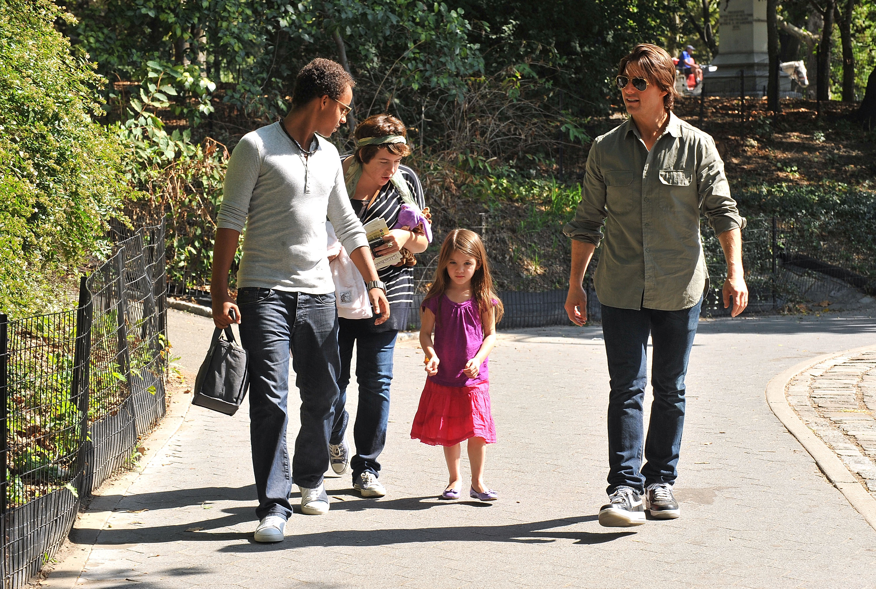 Connor, Isabella, Suri, and Tom Cruise spotted walking in Central Park West in New York City, 2010 | Source: Getty Images