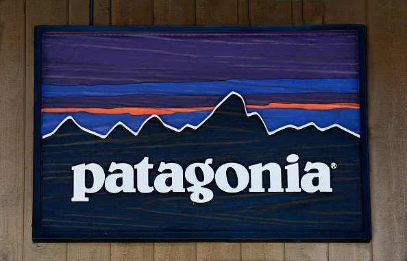 A sign hangs over the entrance to the Patagonia outdoor clothing shop in Vail, Colorado. The retail chain is based in Ventura, California | Photo: Getty Images