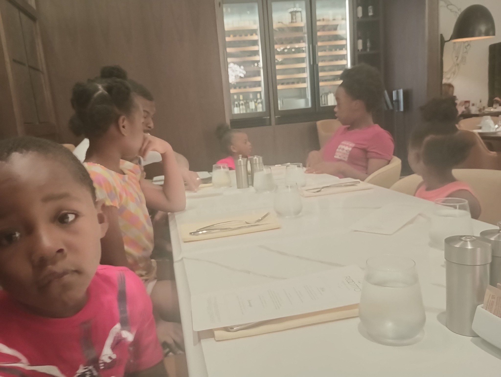 Shamar Elkins out to eat with his kids, posted on June 8, 2025. | Source: Facebook/Shaneiqua Elkins