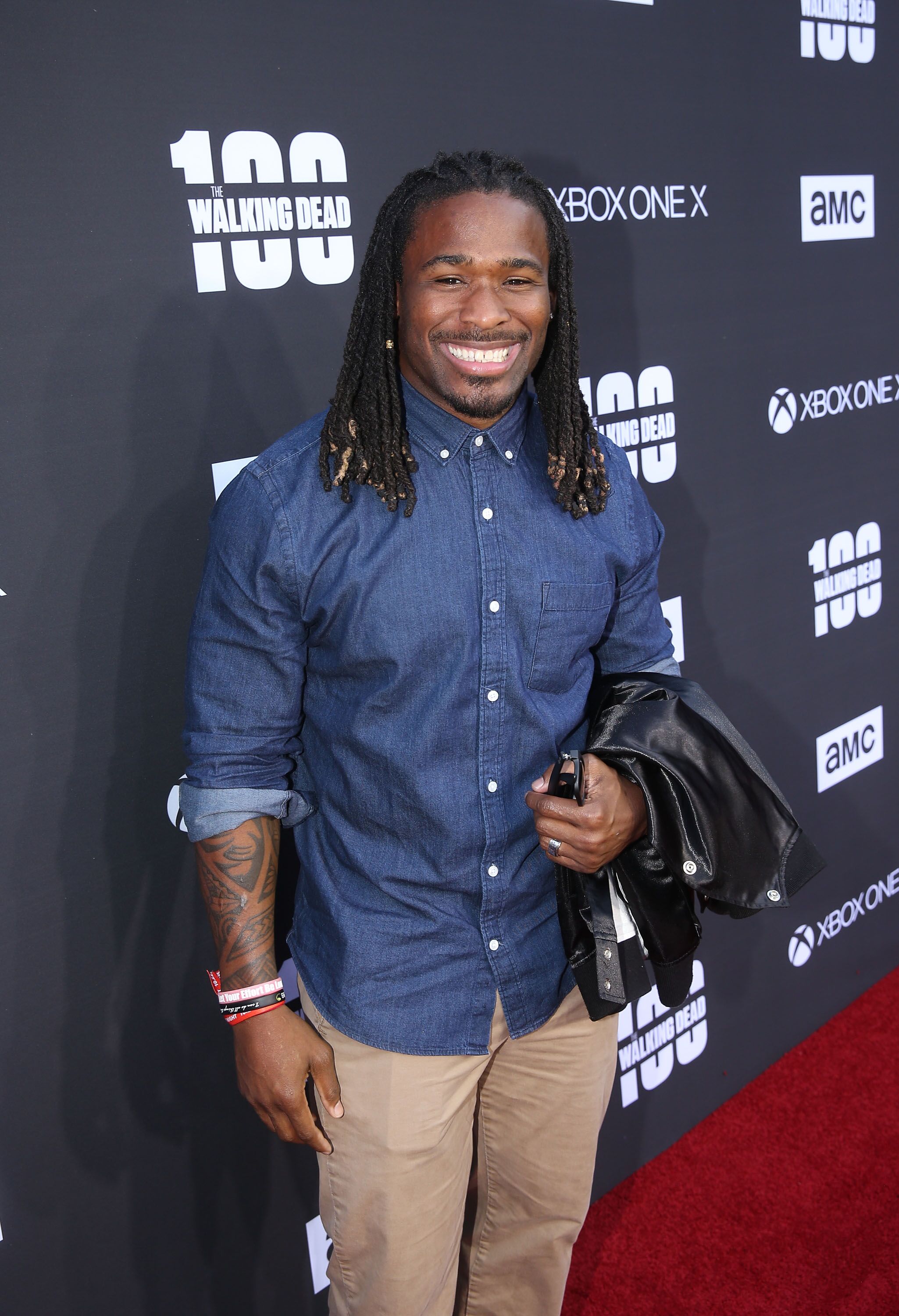 DeAngelo Williams arrives at The Walking Dead 100th Episode Premiere and Party | Source: Getty Images