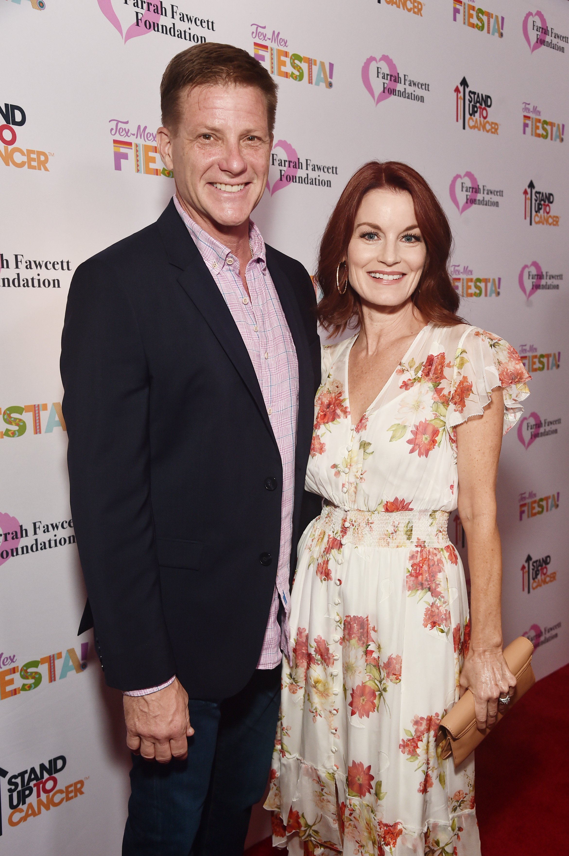Doug Savant (L) and Laura Leighton attend the Farrah Fawcett Foundation's Tex-Mex Fiesta on September 06, 2019, in Los Angeles, California. | Source: Getty Images.