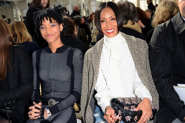 Jada Pinkett Smith and her daughter Willow Smith at the Chanel show during Paris Fashion Week in March 2016. | Photo: Getty Images