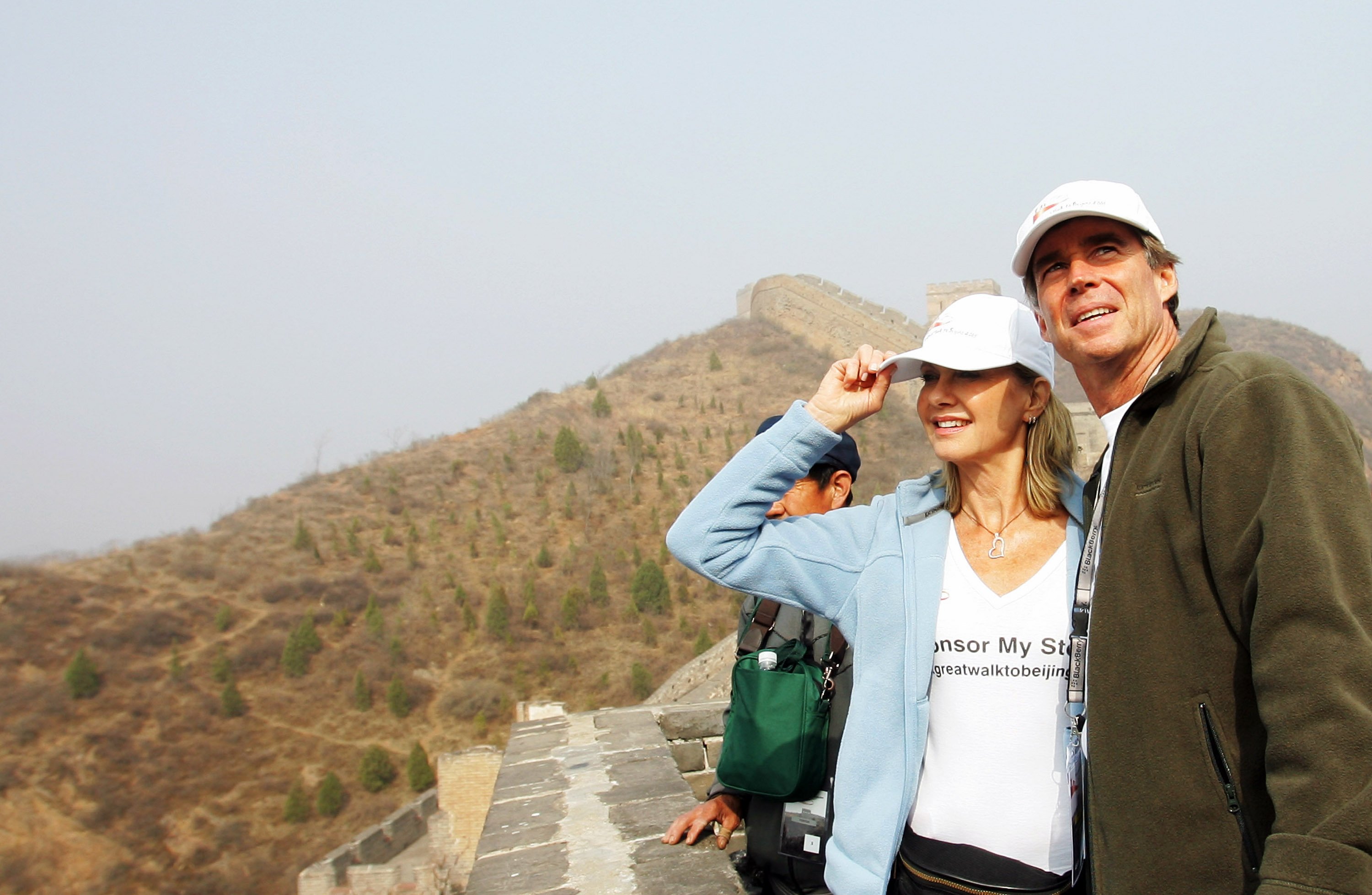 Olivia Newton-John and John Easterling at the Jinshanling Great Wall on April 7, 2008 in Luanping of Hebei province, China | Source: Getty Images