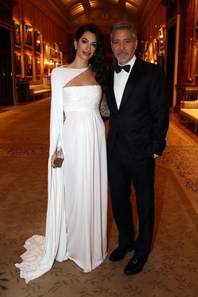 Amal Clooney and George Clooney attend a dinner to celebrate The Prince's Trust, hosted by Prince Charles, Prince of Wales at Buckingham Palace | Getty Images