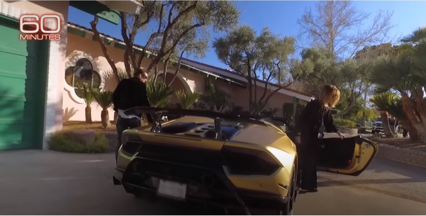 Cage's gold Lamborghini parked outside his home. | Source: YouTube.com/60 Seconds
