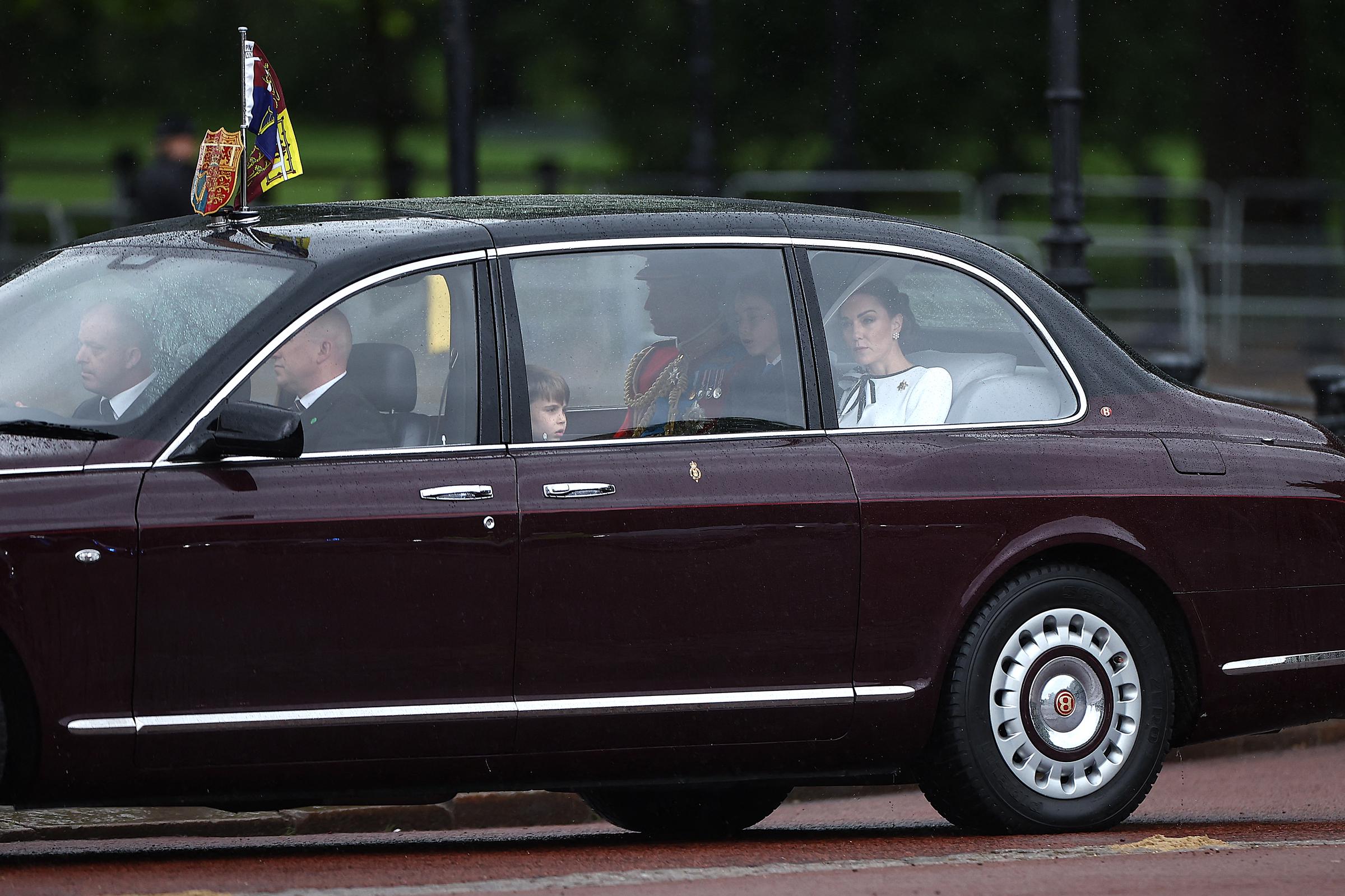 Princess of Wales, Catherine, arrives with Prince William, and their children to Buckingham Palace before the King's Birthday Parade "Trooping the Colour" in London on June 15, 2024 | Source: Getty Images