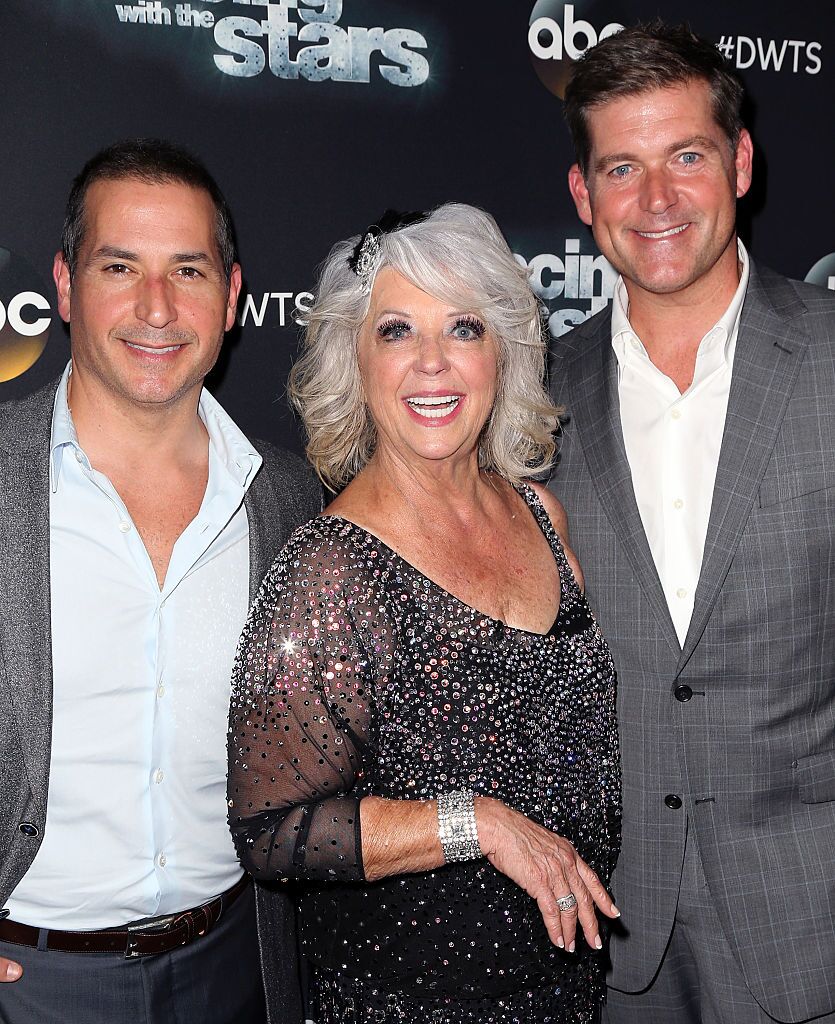 Celebrity chef/TV personality Paula Deen (C) poses with sons cook/TV personality Bobby Deen (L) and cook/TV personality Jamie Deen at 'Dancing with the Stars' Season 21  | Getty Images