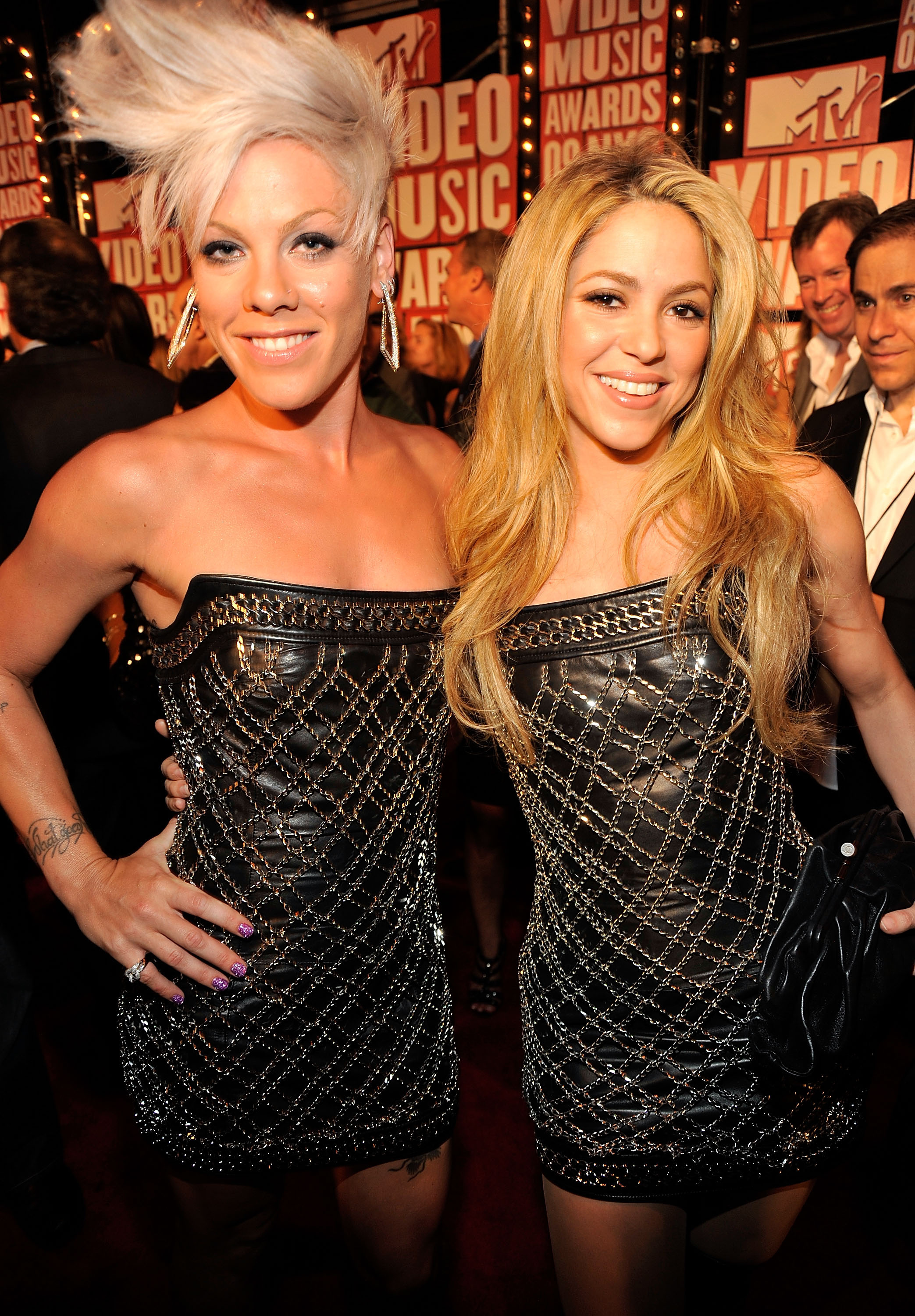 Pink and Shakira pose as they attend the MTV Video Music Awards at Radio City Music Hall on September 13, 2009, in New York City. The two look gorgeous and pleasantly surprised as they realize they are both wearing the same Balmain sequined mini dress.