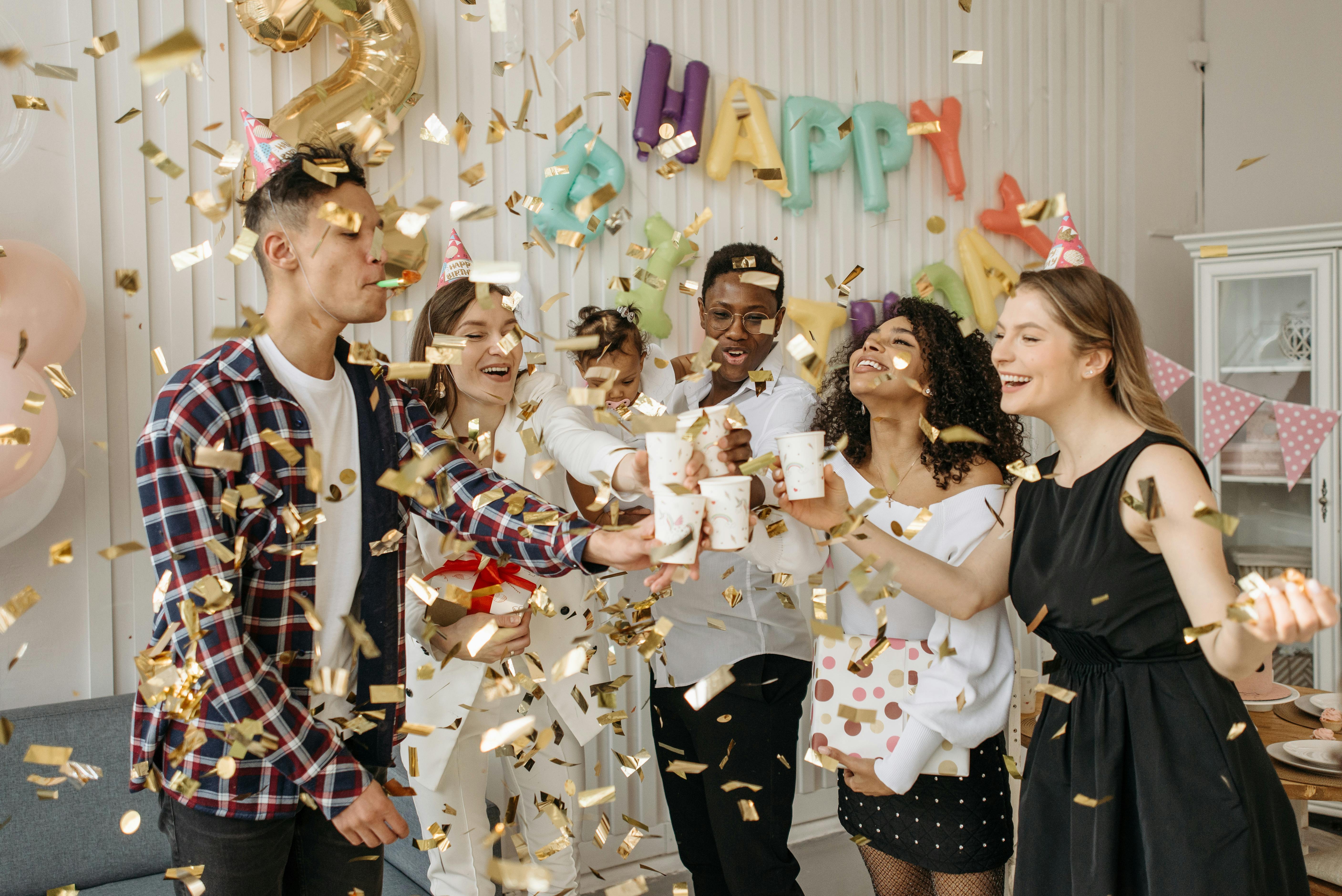 People celebrating at a birthday party | Source: Pexels