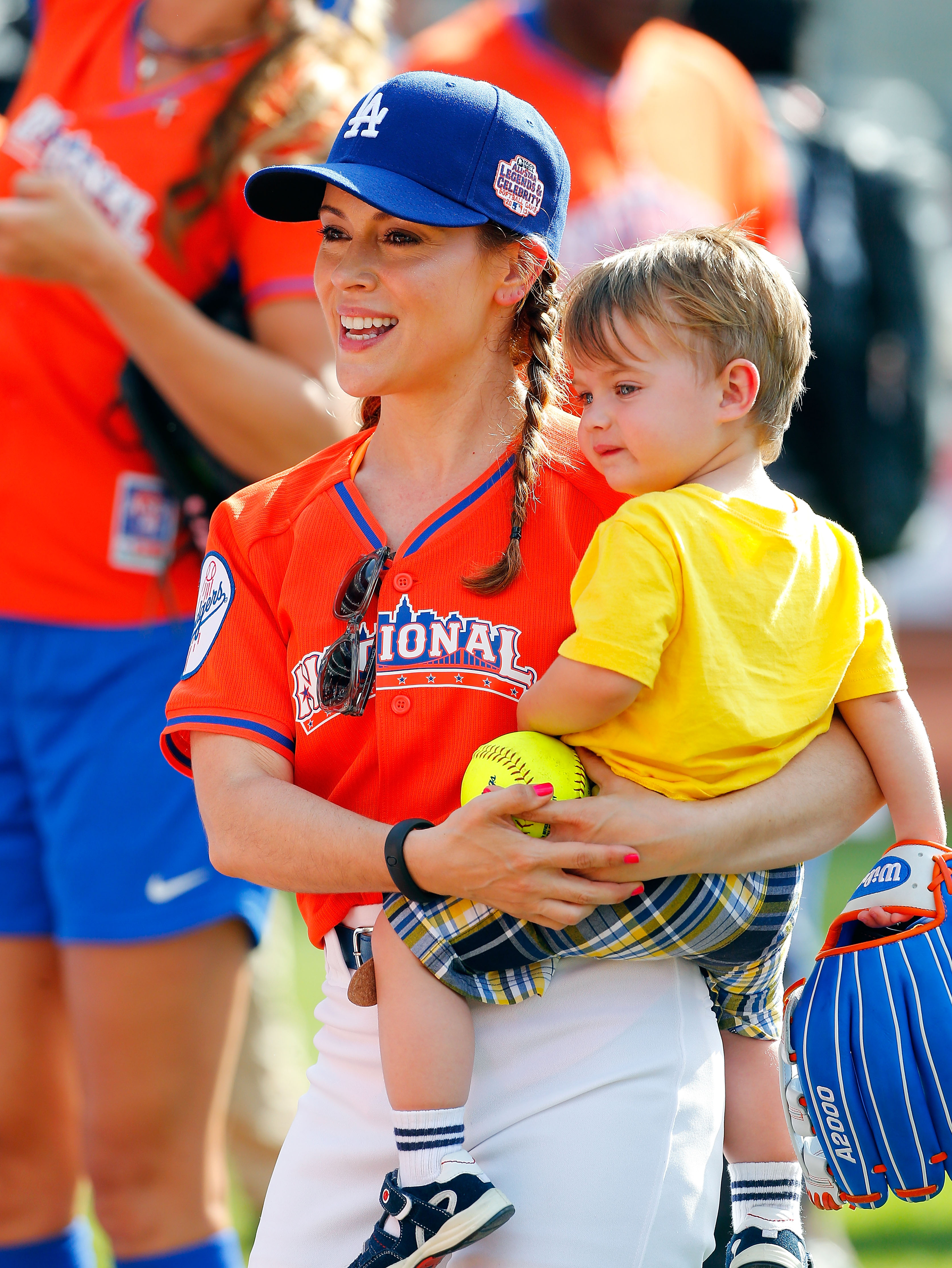 Alyssa Milano and Milo Thomas Bugliari during the Taco Bell All-Star Legends & Celebrity Softball Game at Citi Field on July 14, 2013 in New York City | Source: Getty Images