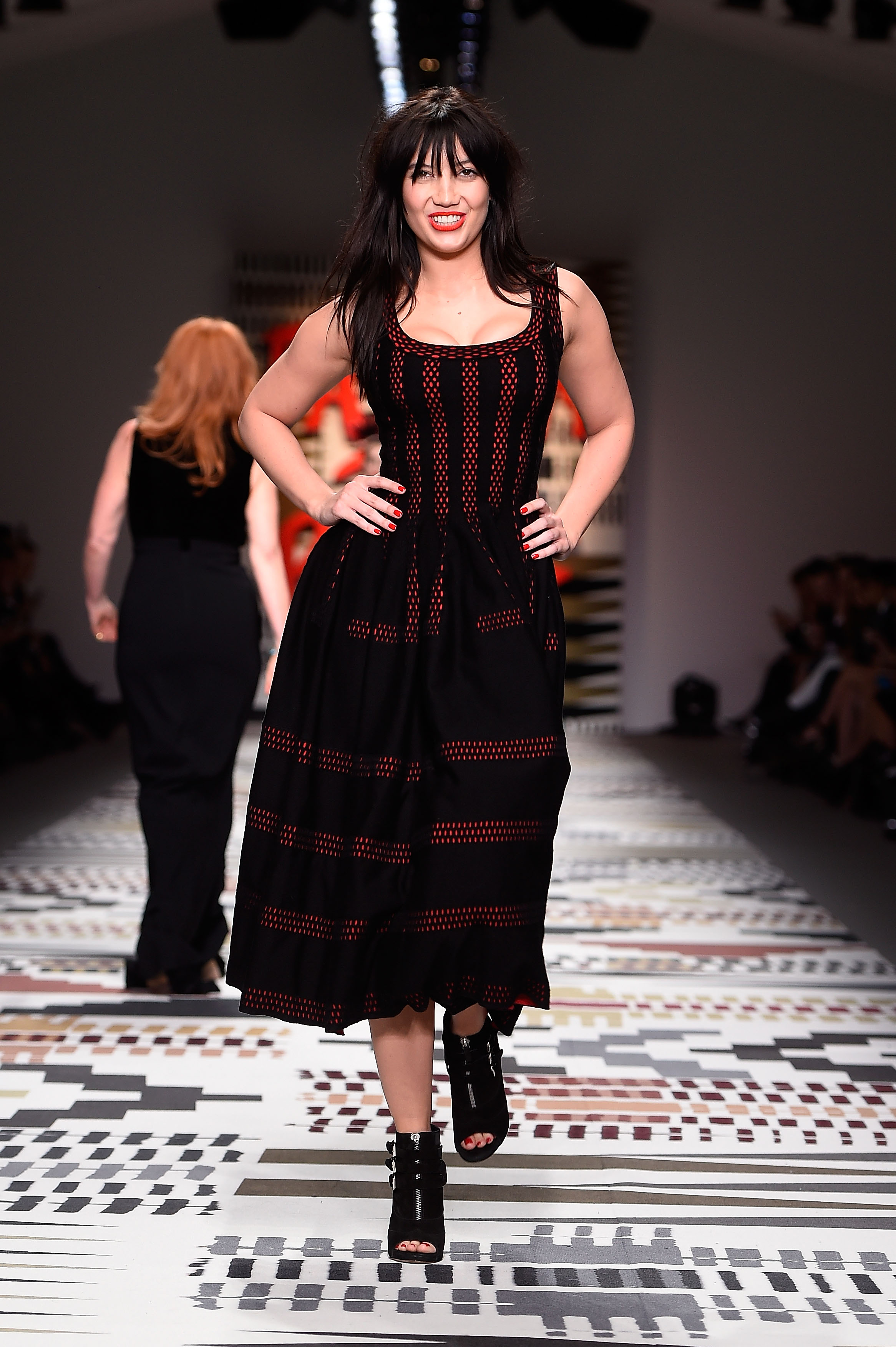 Daisy Lowe walks in the Fashion For Relief charity show at London Fashion Week on February 19, 2015, in support of Ebola relief efforts | Source: Getty Images