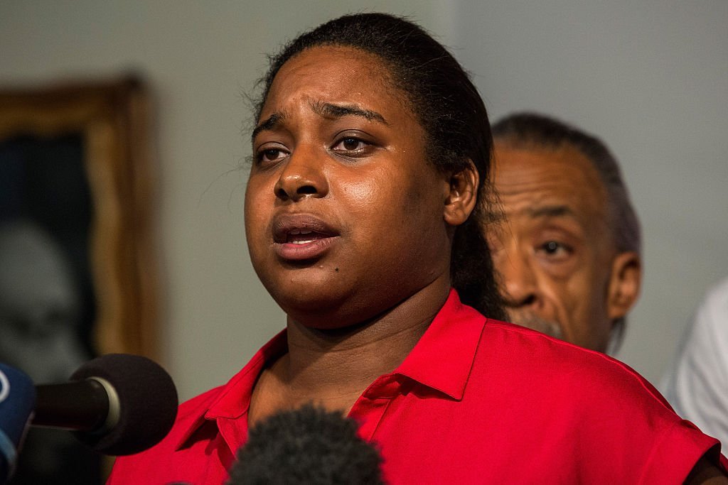 Erica Garner, Eric Garner's daughter, attends a press conference held with her familiy members and the Reverand Al Sharpton calling for further justice and legal action against the police officers responsible in the death of Eric Garner | Photo: Getty Images