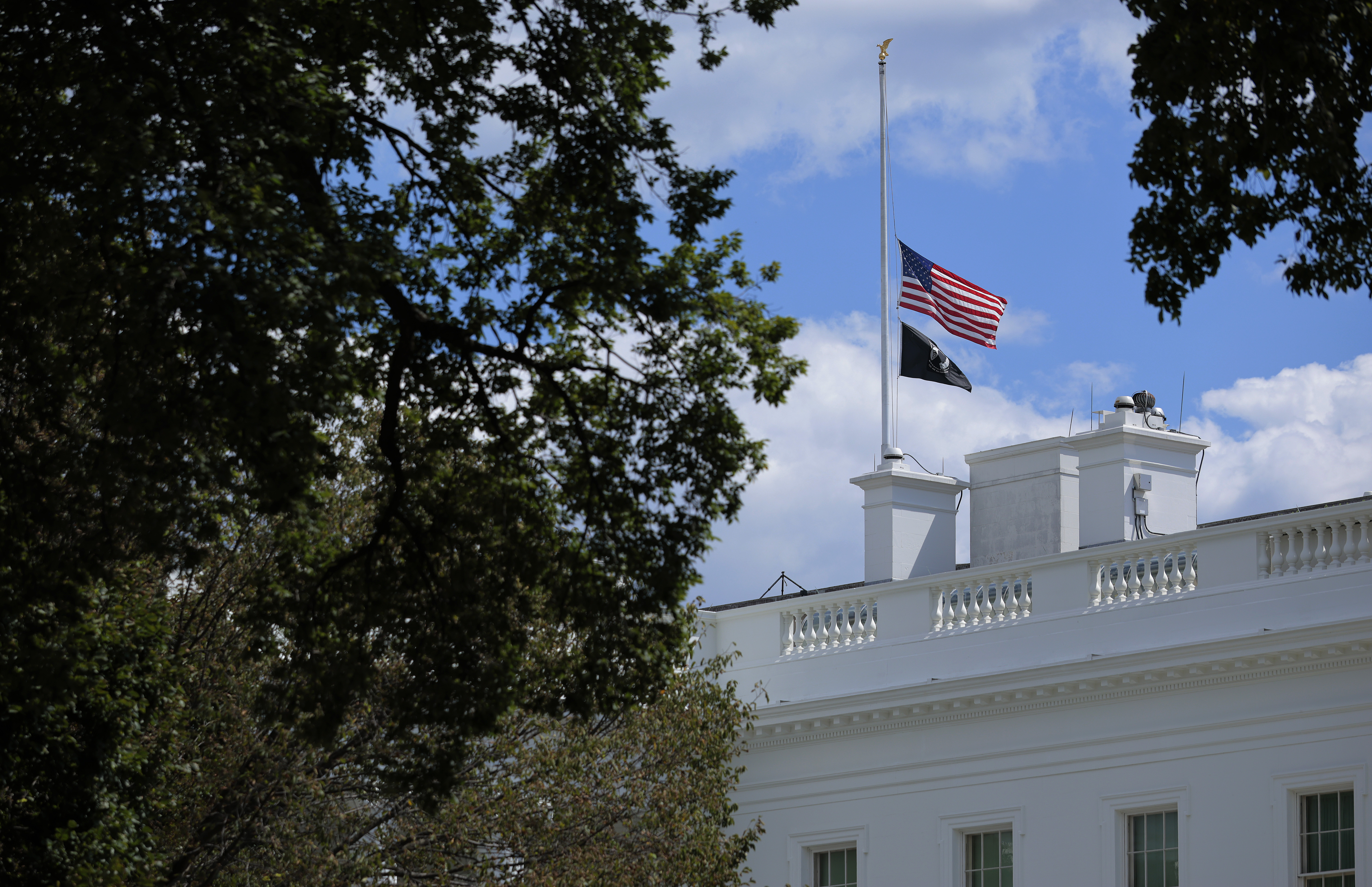 The U.S. flag flies at half-staff above the White House after President Donald Trump ordered the tribute for victims of the Minneapolis church shooting on August 27, 2025 | Source: Getty Images