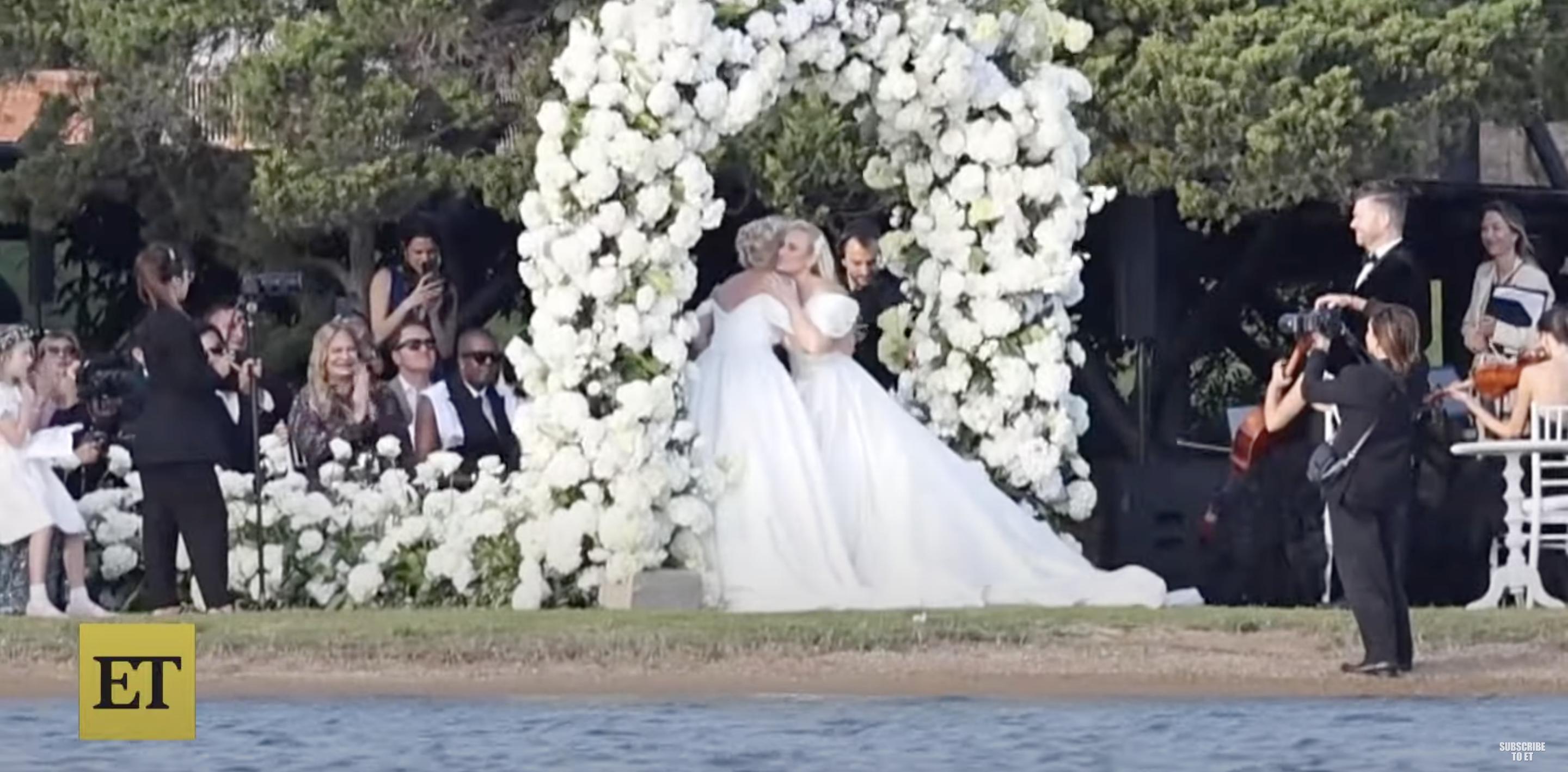 Rebel Wilson and Ramona Agruma exchanging vows on their wedding day posted on October 1, 2024 | Source: YouTube/@EntertainmentTonight