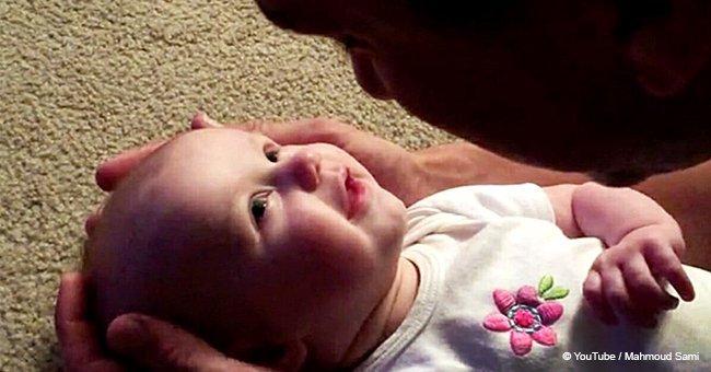 Man sings classic song to his baby daughter and gets an adorable reaction