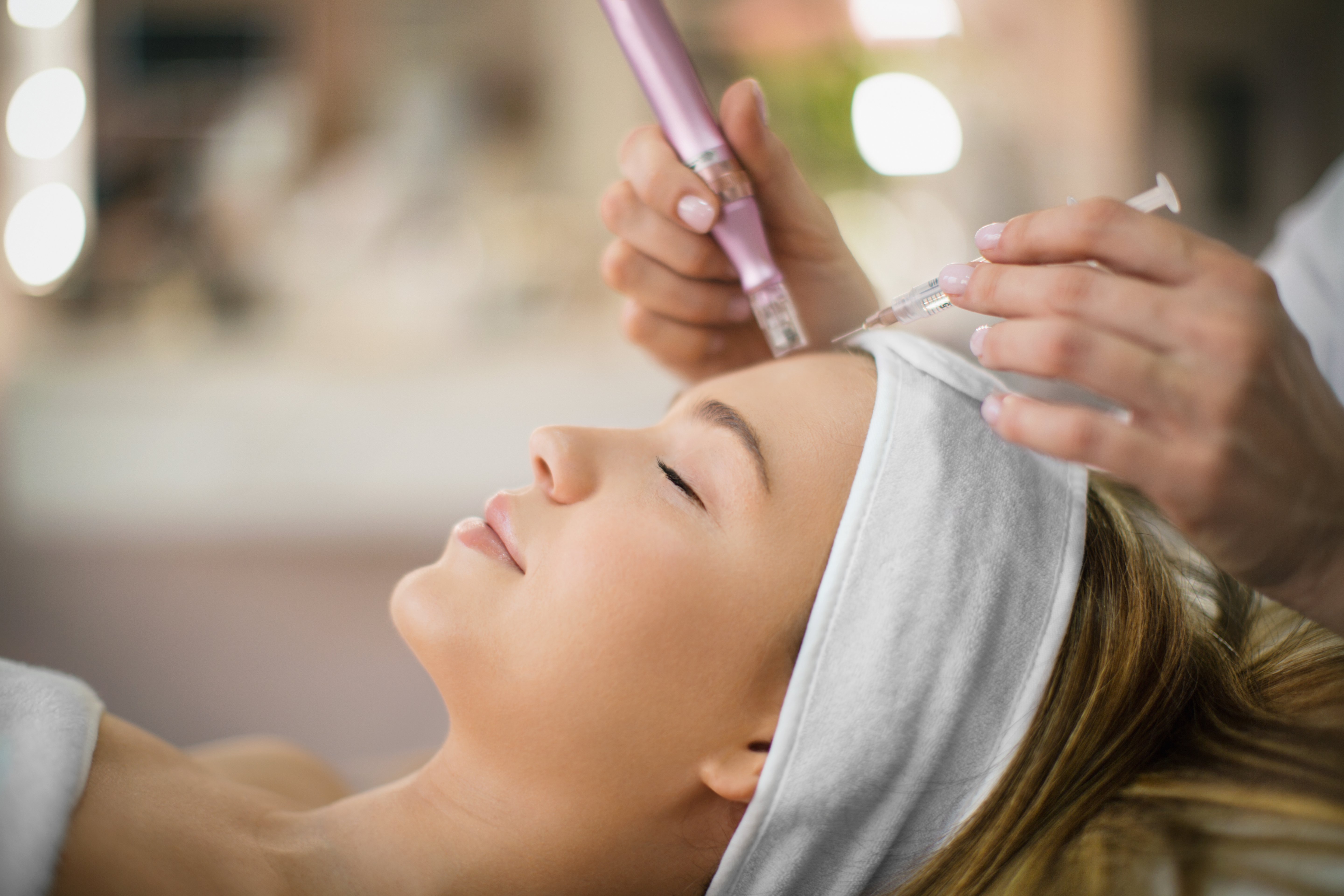 Woman undergoing microneedling procedure. | Source: Getty Images