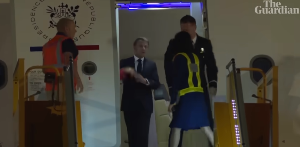 President Emmanuel Macron composes himself before facing the cameras | Source: YouTube/The Guardian