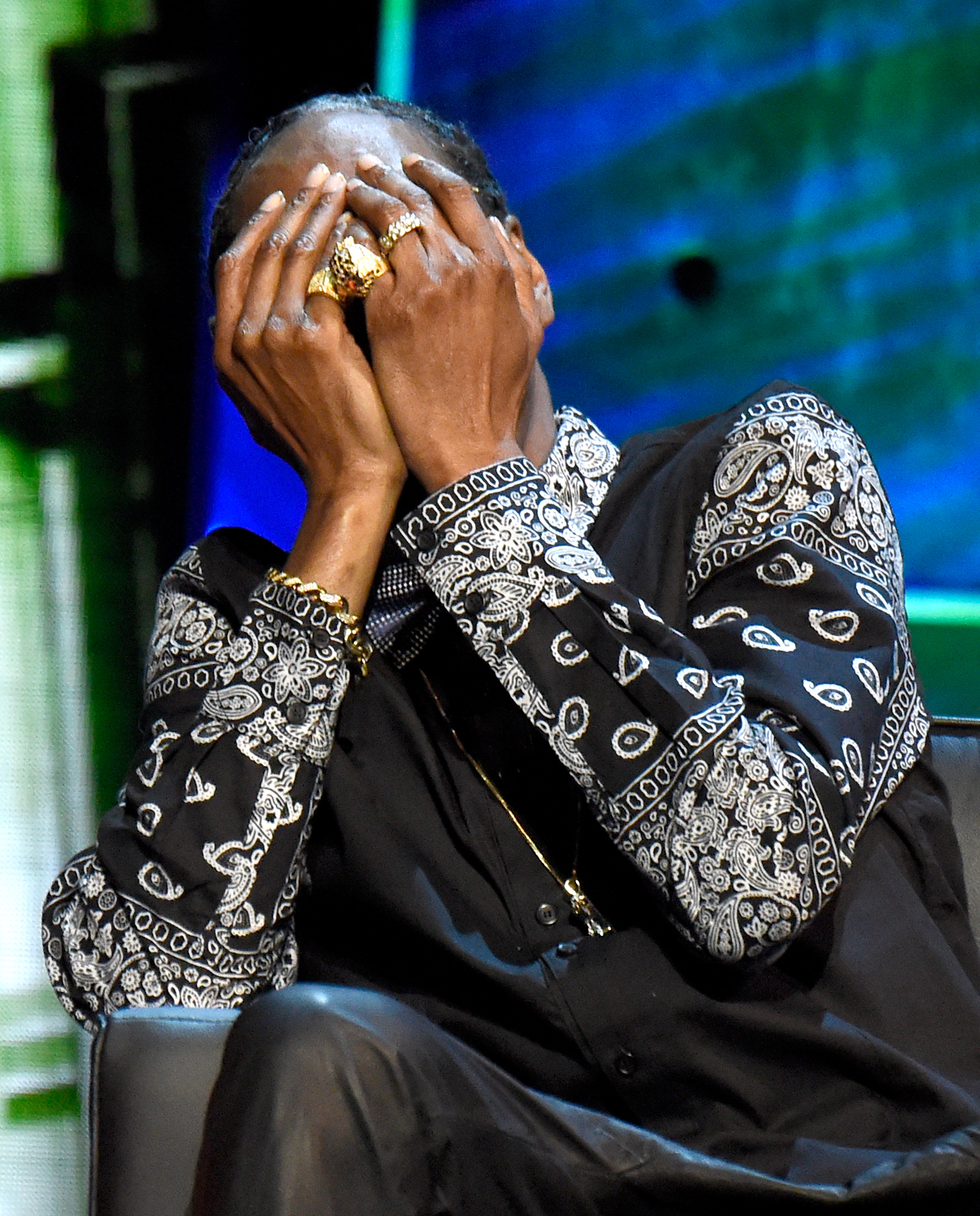 Snoop Dogg covering his face during The Comedy Central Roast of Justin Bieber in Los Angeles, California on March 14, 2015. | Source: Getty Images