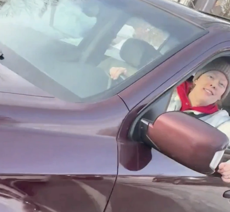 Renee Good turns to the window as the agent approaches, from a video post dated January 9, 2026. | Source: YouTube/FoxNews