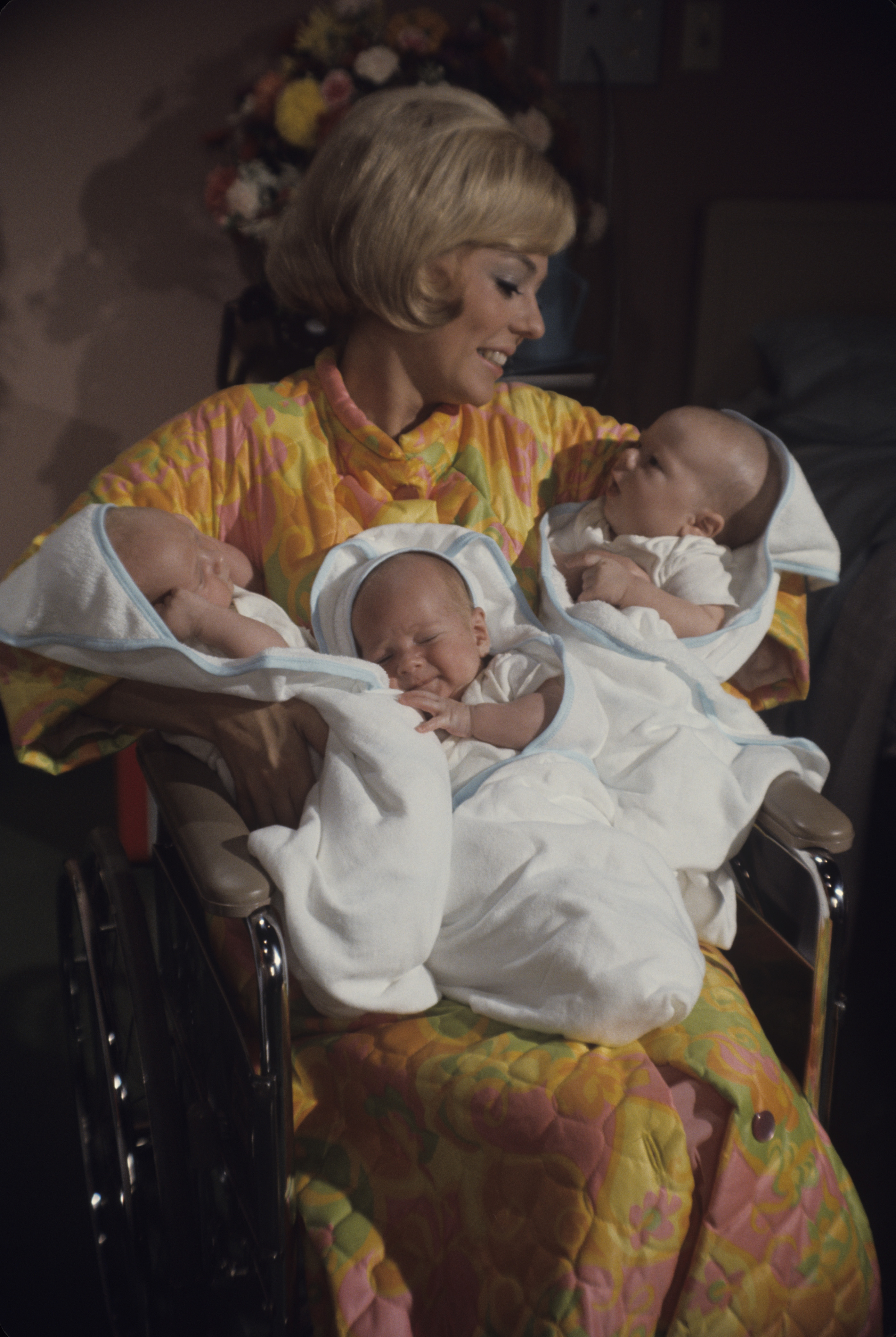 An undated image of triplets and Tina Cole on the set of "My Three Sons" | Source: Getty Images