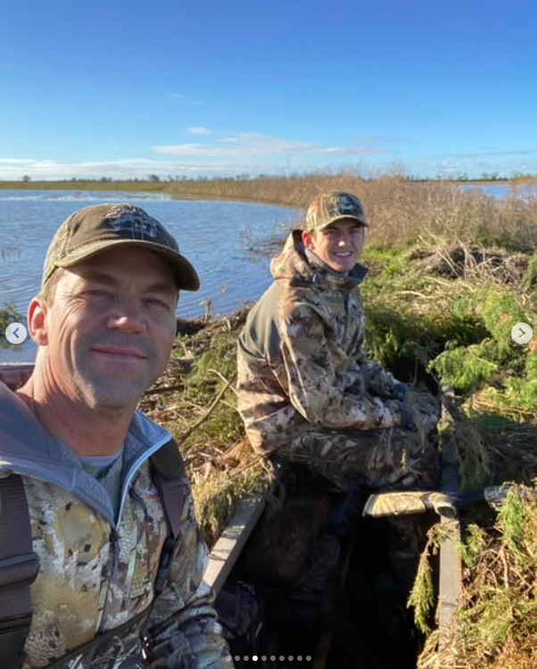 Bryon and Booker Noem taking a photo while out hunting. | Source: Instagram/sdbryonnoem