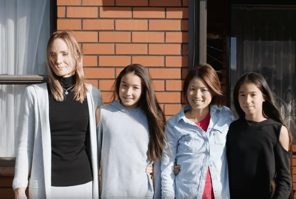 Natalie and Shoko Woods and their daughters Ashley and Sonia.