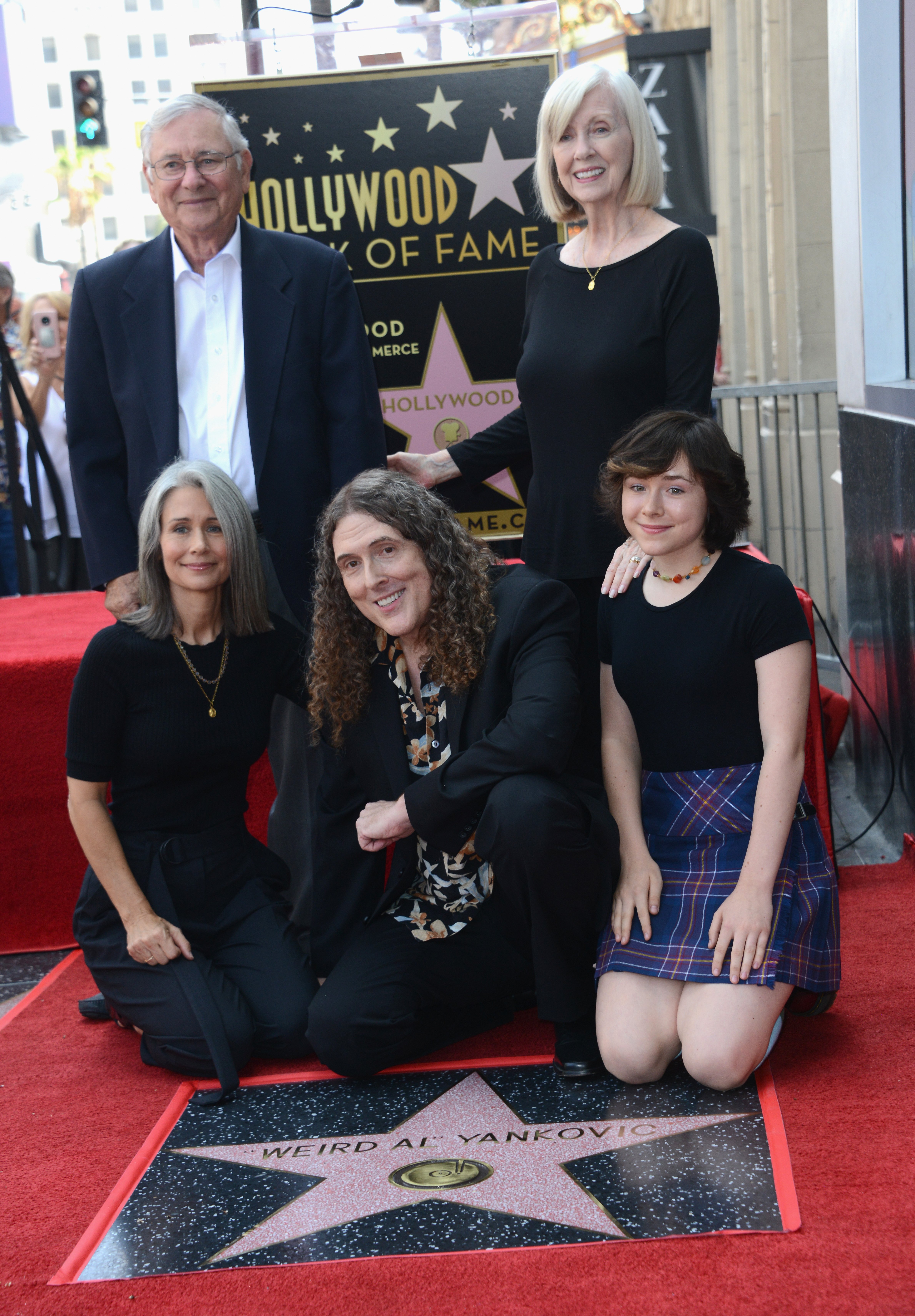 "Weird Al" Yankovic with his wife, daughter, and parents at his Star Ceremony On The Hollywood Walk Of Fame on August 27, 2018, in Hollywood, California. | Source: Getty Images