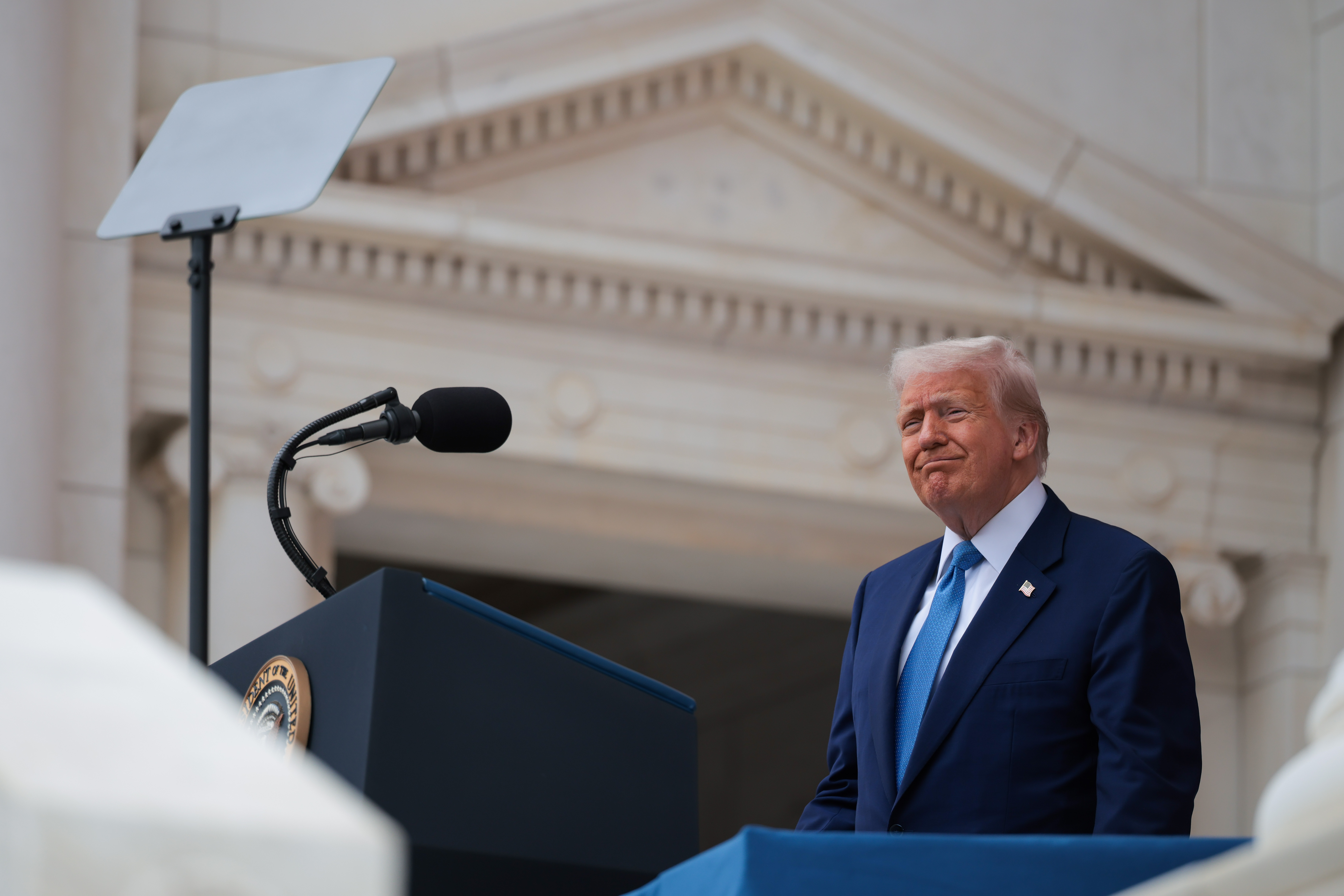 President Donald Trump speaks during the Memorial Day wreath-laying ceremony on May 26, 2025, in Arlington, Virginia | Source: Getty Images