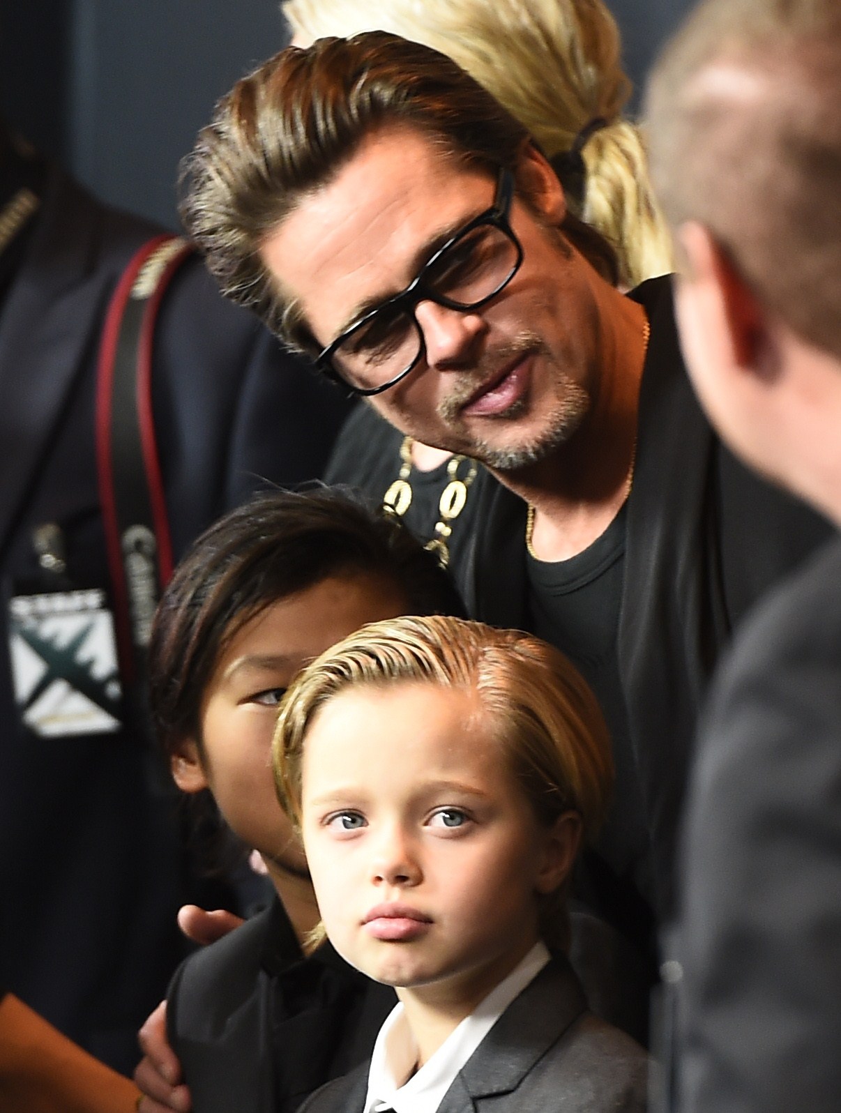 Brad Pitt and his children Pax and Shiloh in California in 2014. | Source: Getty Images