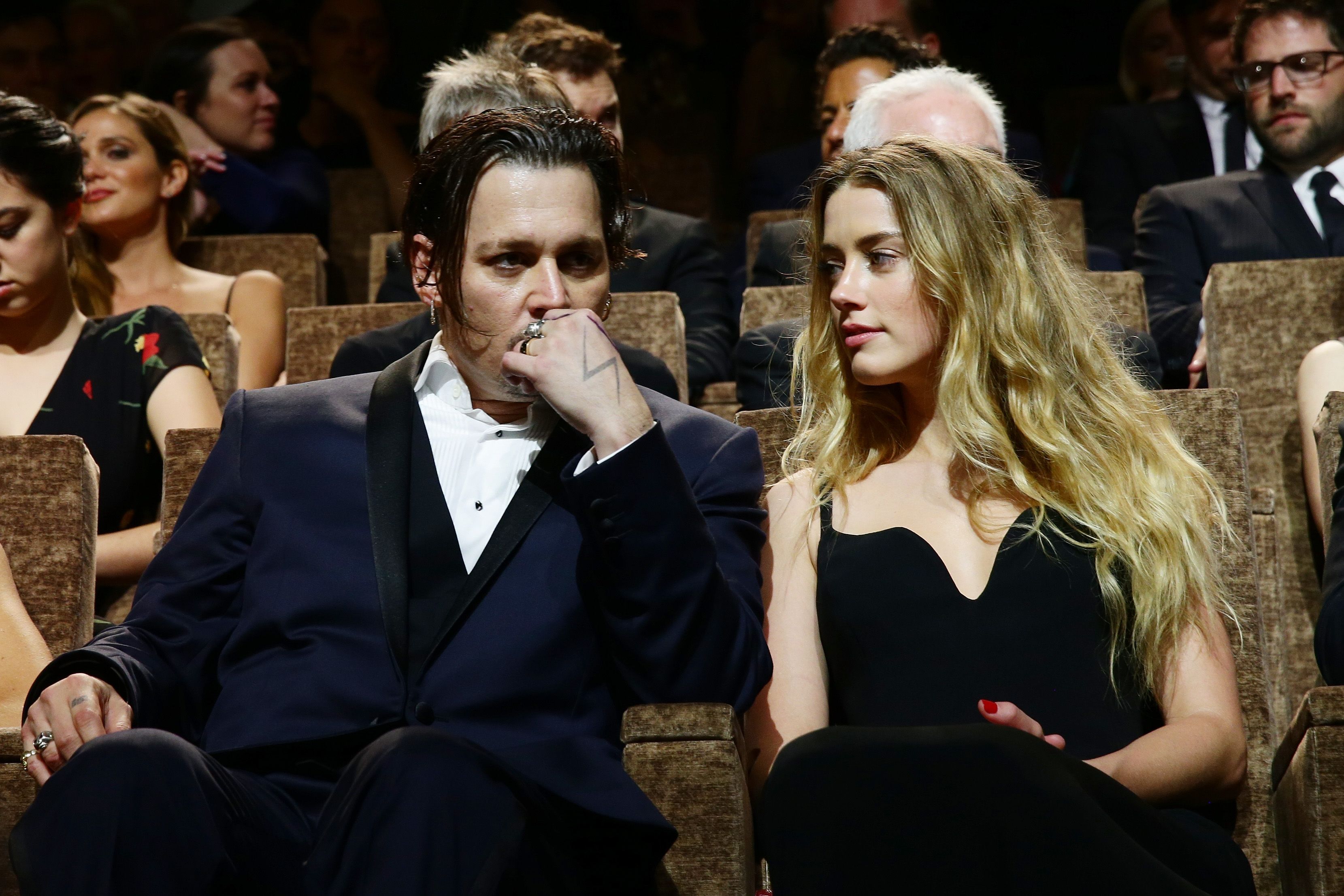 Johnny Depp and Amber Heard at a premiere for "Black Mass" during the 72nd Venice Film Festival on September 4, 2015, in Italy | Photo: Vittorio Zunino Celotto/Getty Images