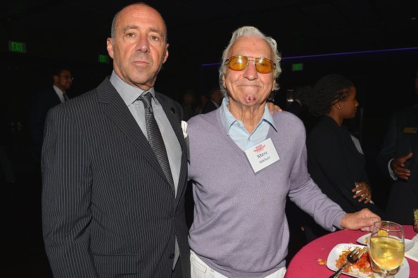 Bob Beitcher and Merv Adelson attend the Unsung Heroe Awards at Club Nokia on October 9, 2013, in Los Angeles, California. | Source: Getty Images.