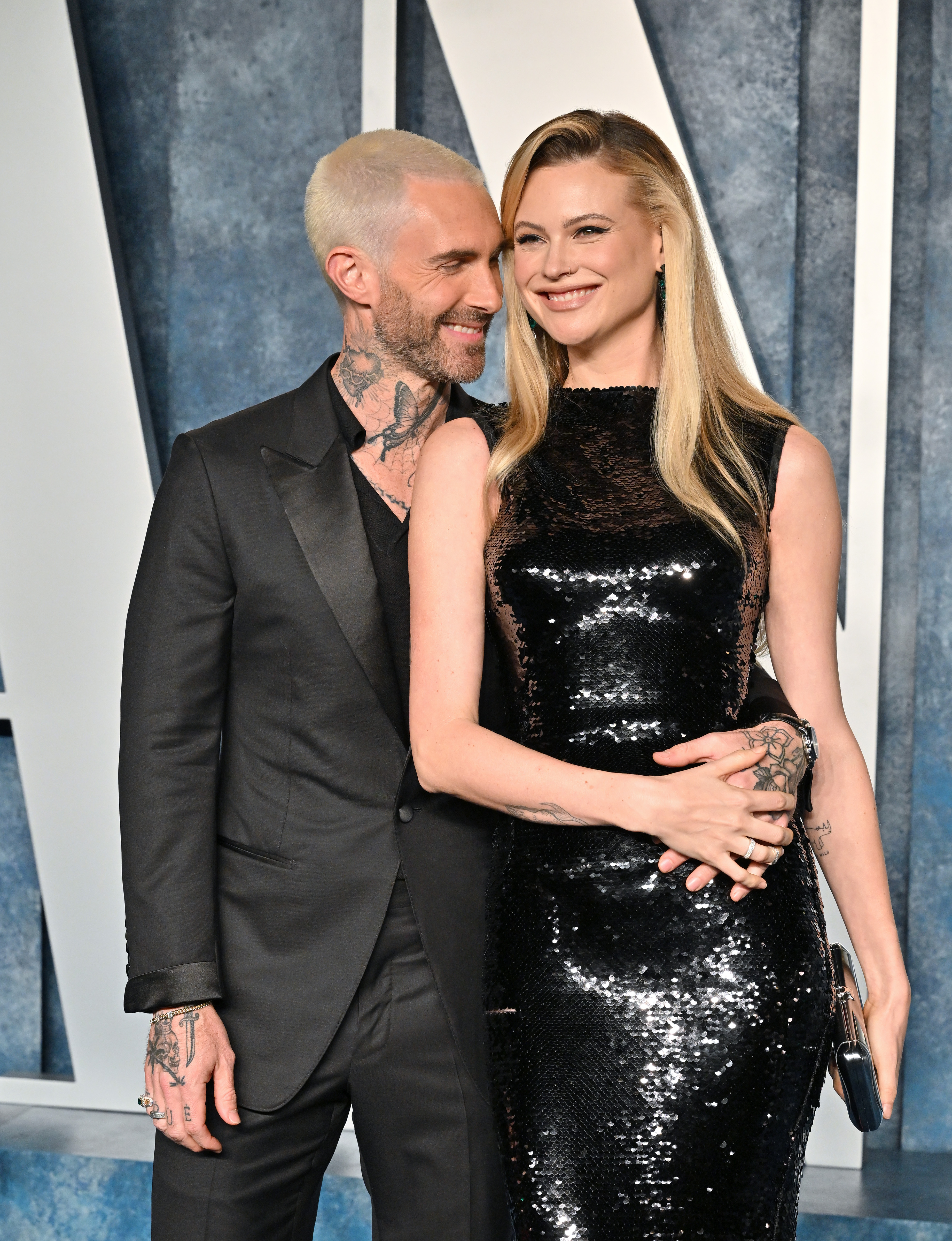Adam Levine and Behati Prinsloo pose at the 2023 Vanity Fair Oscar Party hosted by Radhika Jones at Wallis Annenberg Center for the Performing Arts on March 12, 2023, in Beverly Hills, California | Source: Getty Images