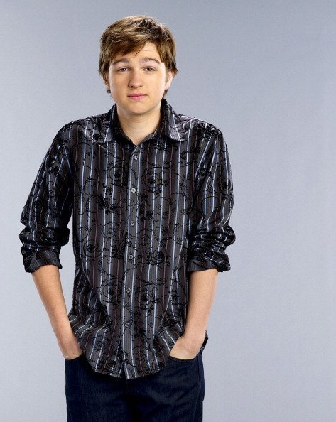 Angus T. Jones poses for his show "Two and a Half Men" in 2003 | Source: Getty Images