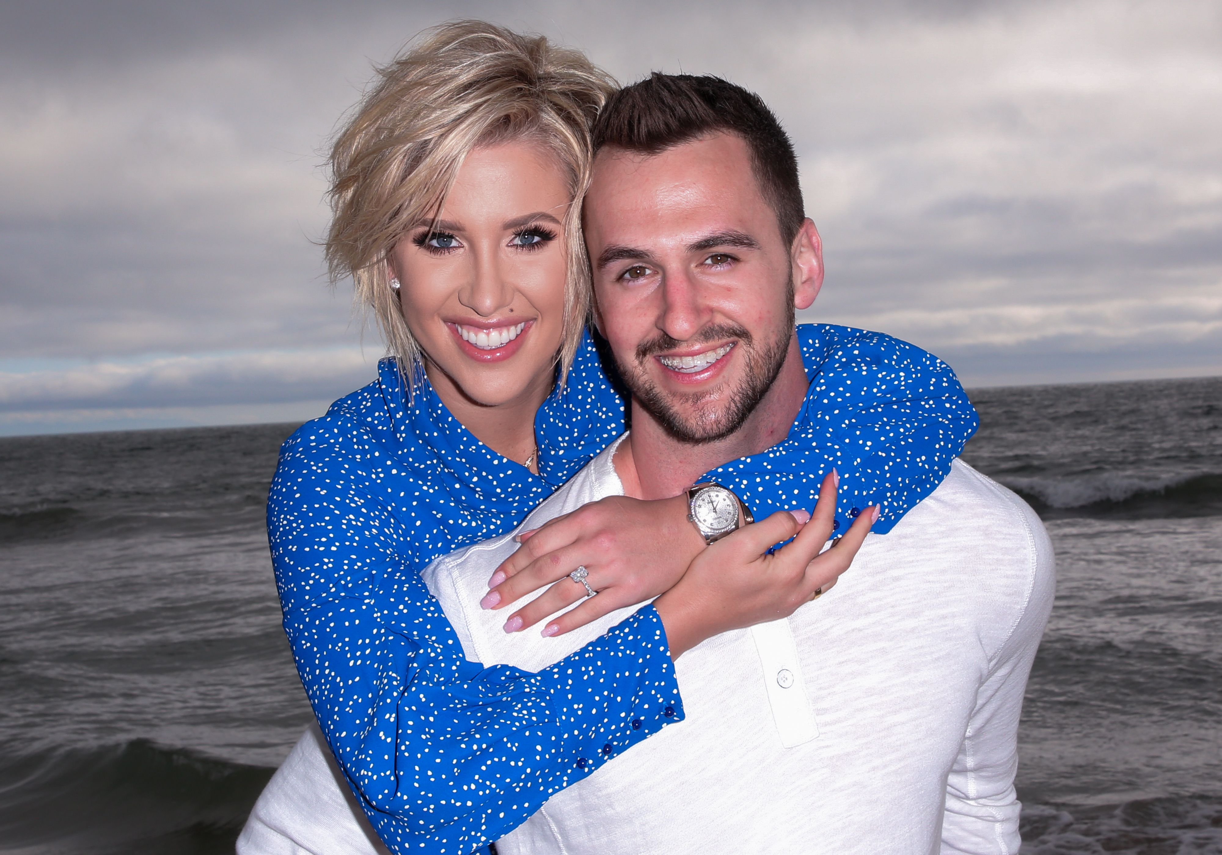 Savannah Chrisley and Nic Kerdiles smile for an engagement photo on March 27, 2019 in Santa Monica, California. | Source: Getty Images