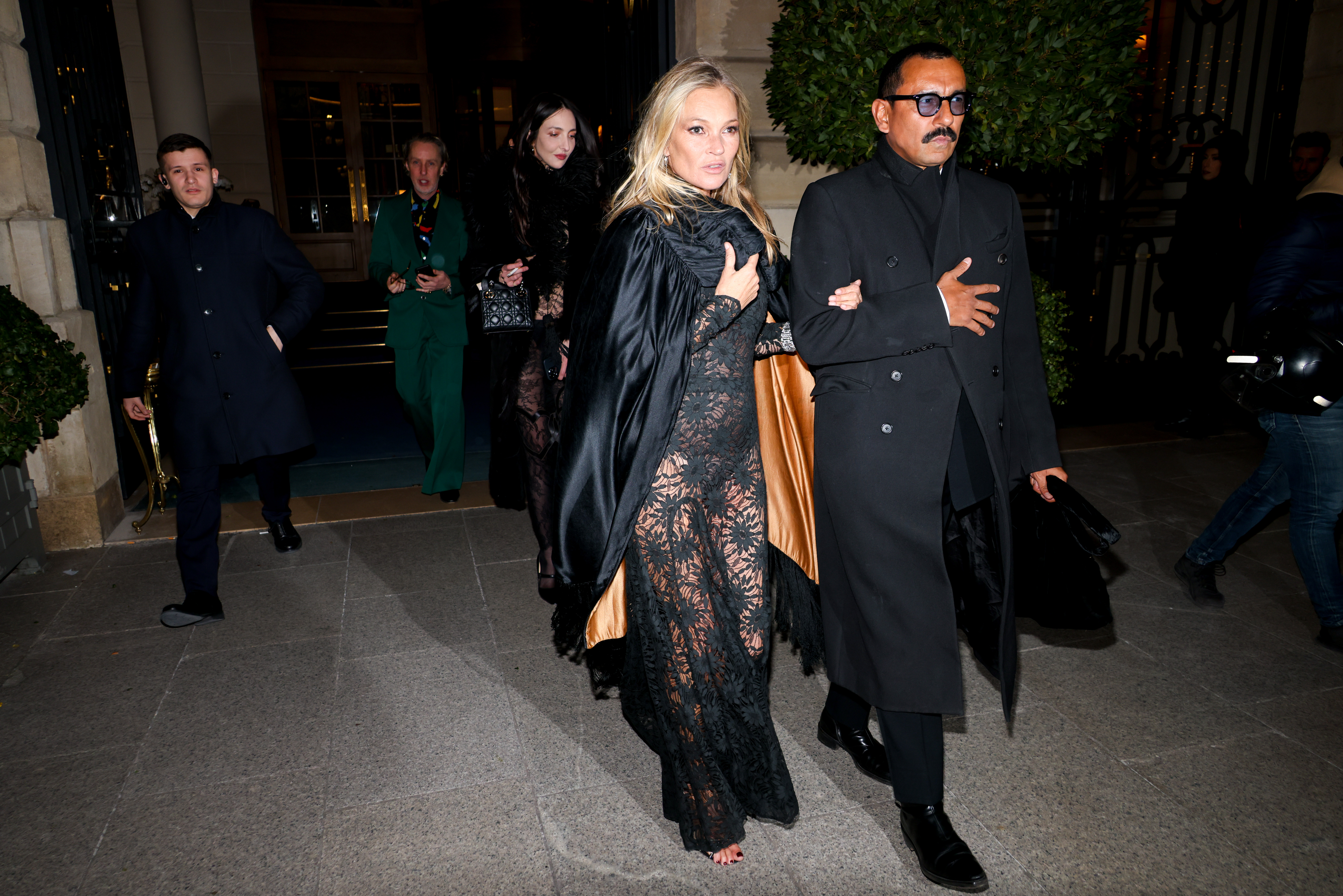 Kate Moss and Halder Ackerman arriving at the Saint Laurent restaurant at The Ritz in Paris for Moss' 50th birthday celebration in January 2024 | Source: Getty Images