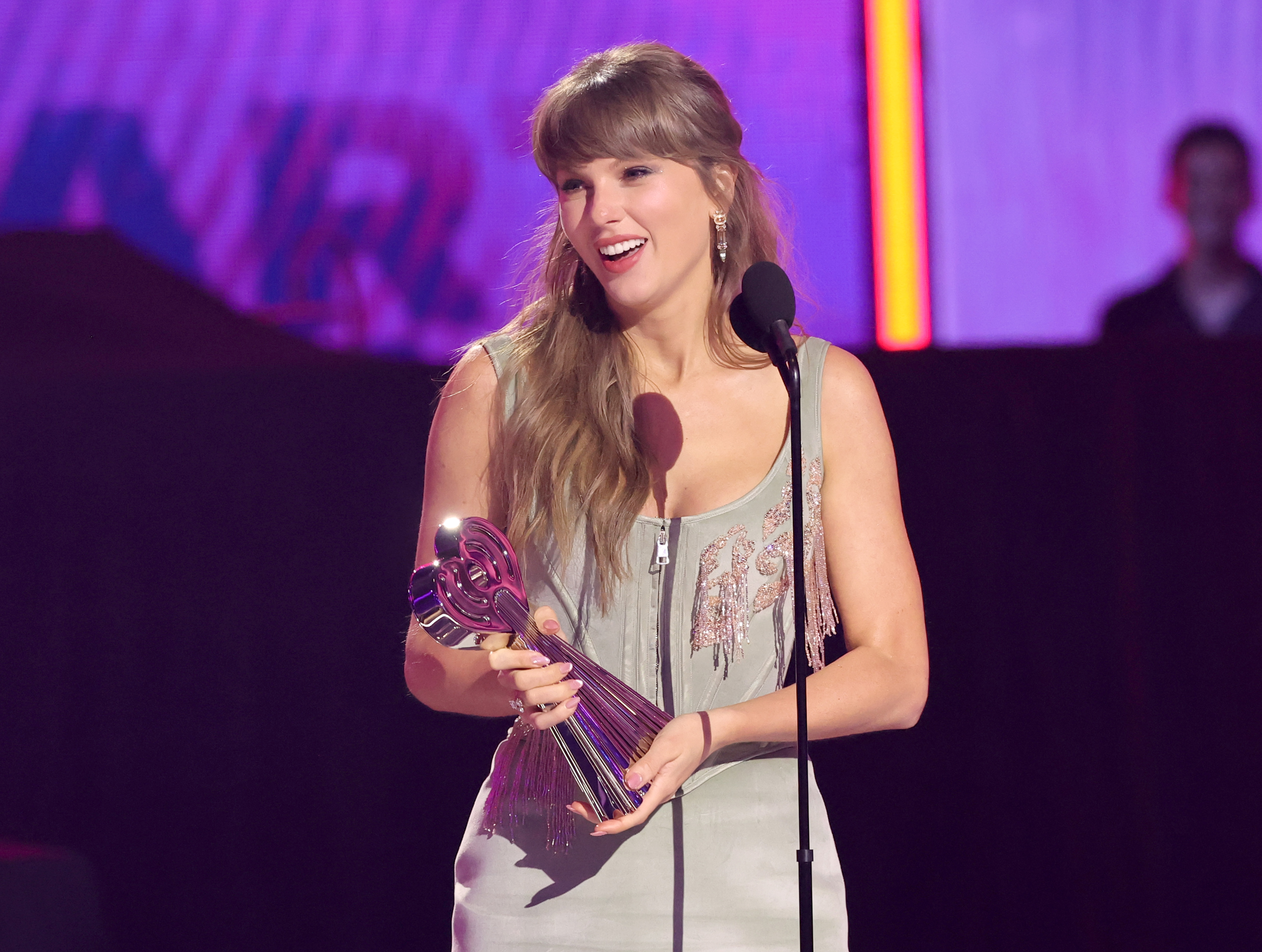 Taylor Swift accepts an award at the iHeartRadio Music Awards in Los Angeles on March 26, 2026 | Source: Getty Images