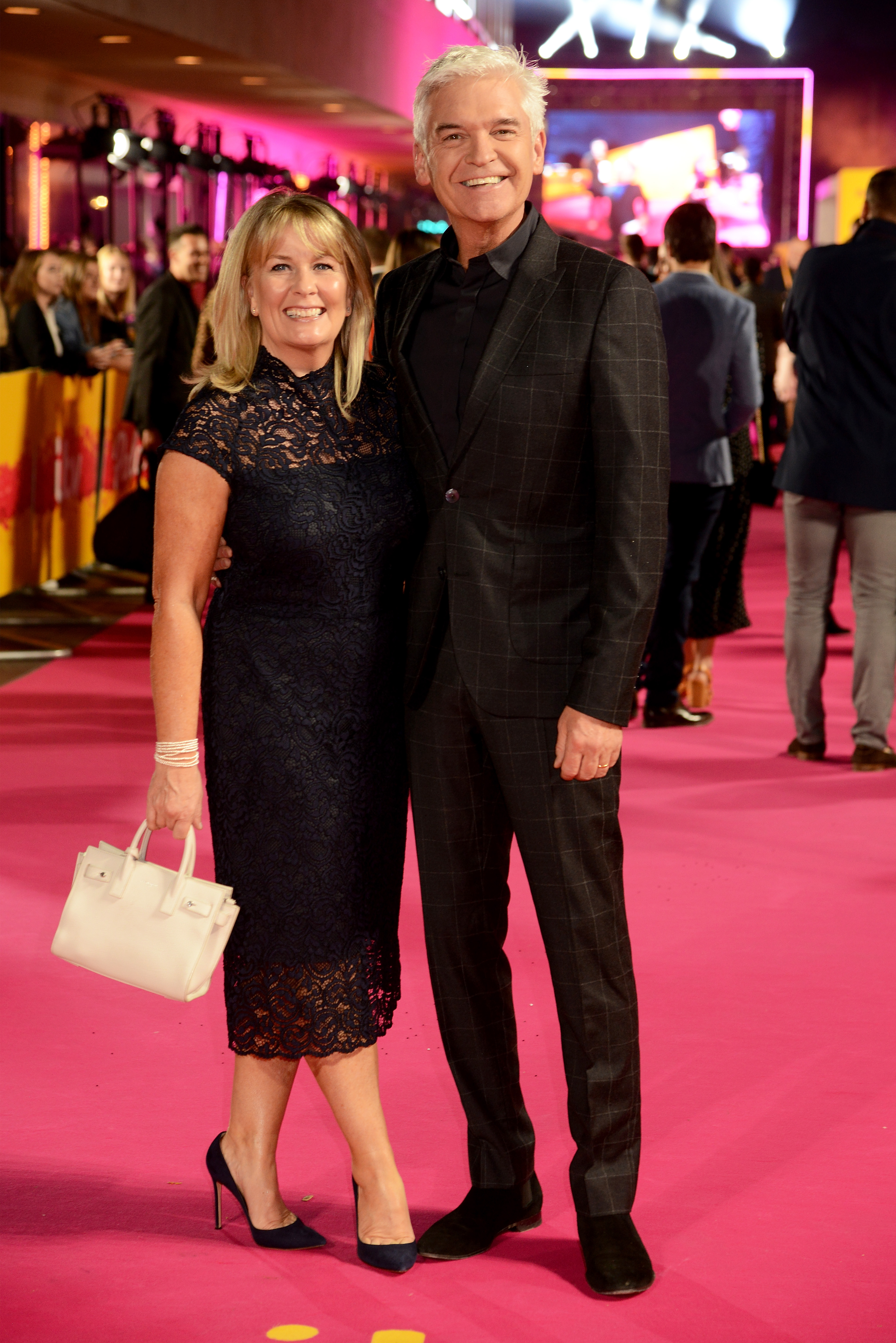 Stephanie Lowe and Phillip Schofield at the ITV Palooza! on October 16, 2018, in London, England. | Source: Getty Images