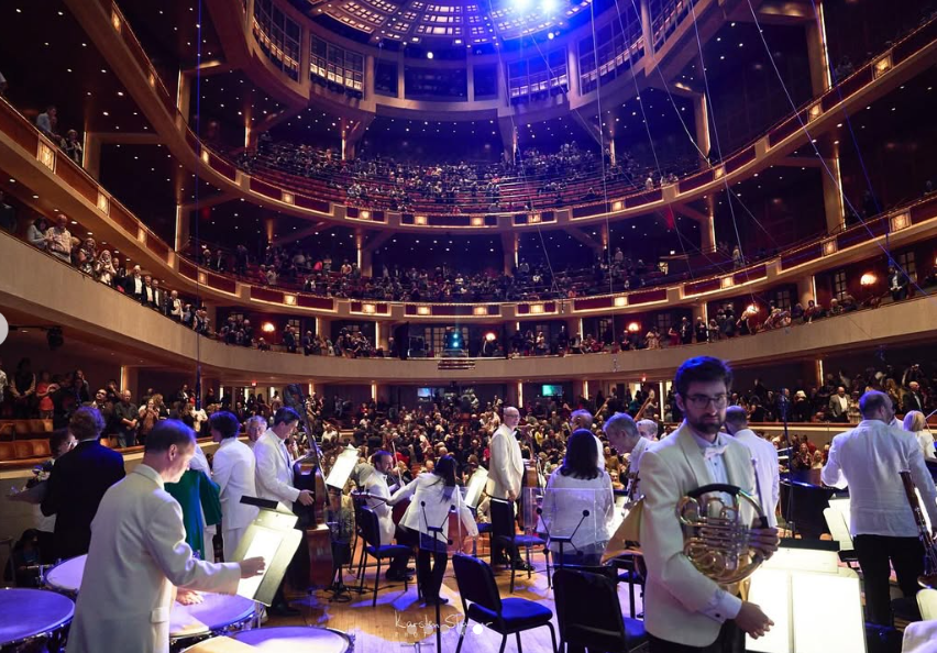 A photo taken during "The Way of the Rain – Hope for Earth – A Symphony for our Planet," a multidisciplinary performance at the Morton H. Meyerson Symphony Hall in Dallas in October 2022 | Source: Instagram/sibylleszaggarsredfordfineart