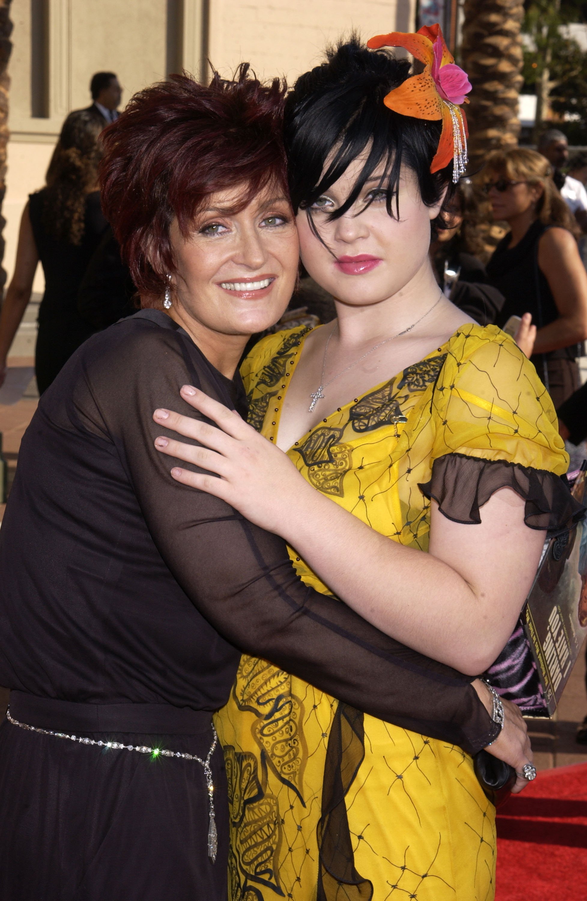 Sharon Osbourne and Kelly Osbourne during 2002 Creative Arts Emmy Awards - Arrivals at Shrine Auditorium in Los Angeles, California, United States in 2002 | Source: Getty Images 