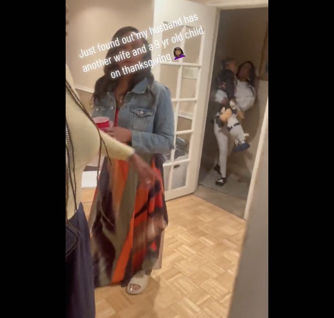 A still from the video showing @CurbservnTV finding her husband had a secret family on Thanksgiving 2022 | Source: tiktok.com/@curbservn1
