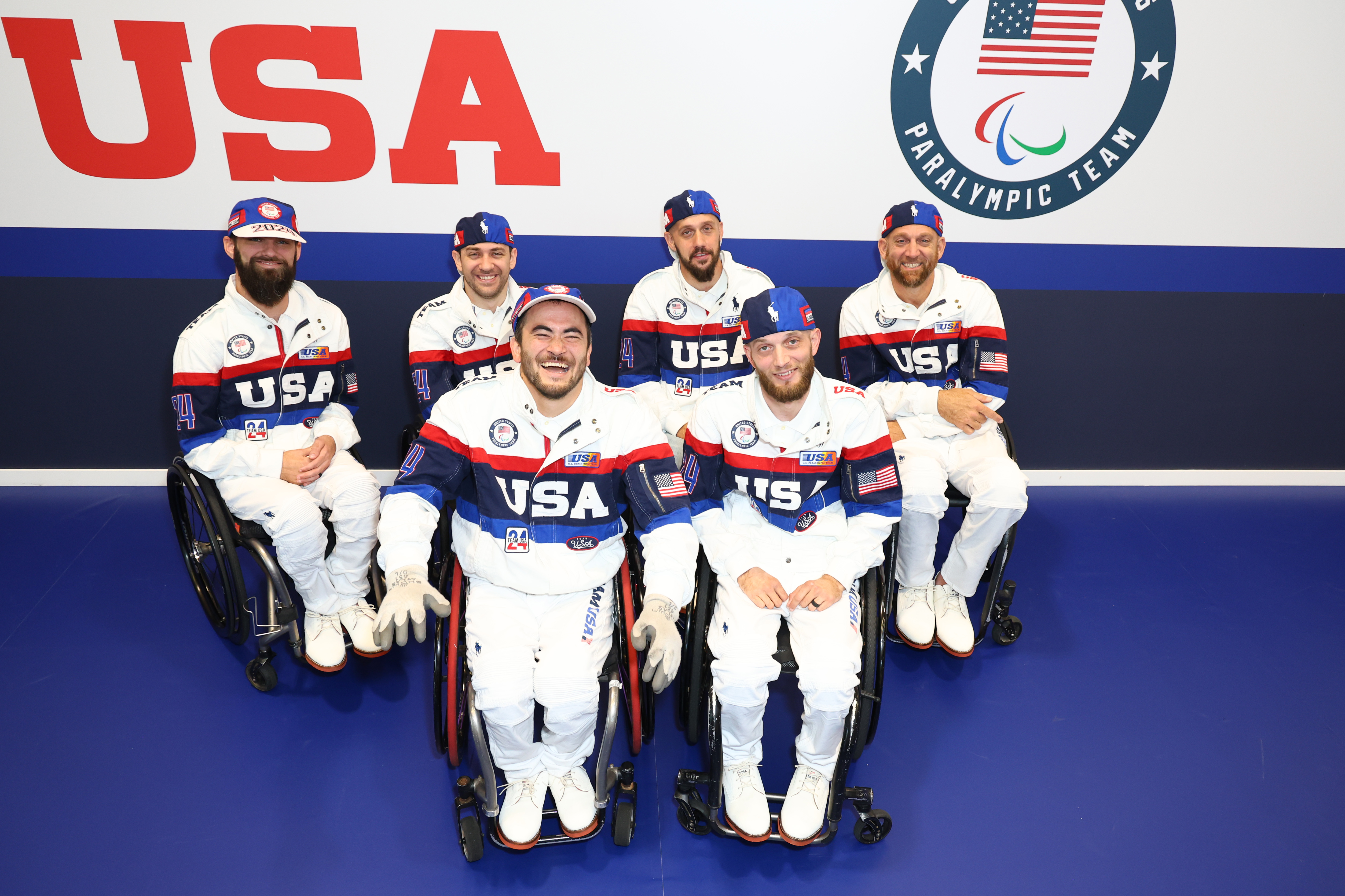 Team USA Paralympians Clayton Brackett, Jeff Butler, Charles Aoki, Eric Newby, Bradley Hudspeth and Chuck Melton pose for a photo in Paris, France on August 22, 2024 | Source: Getty Images