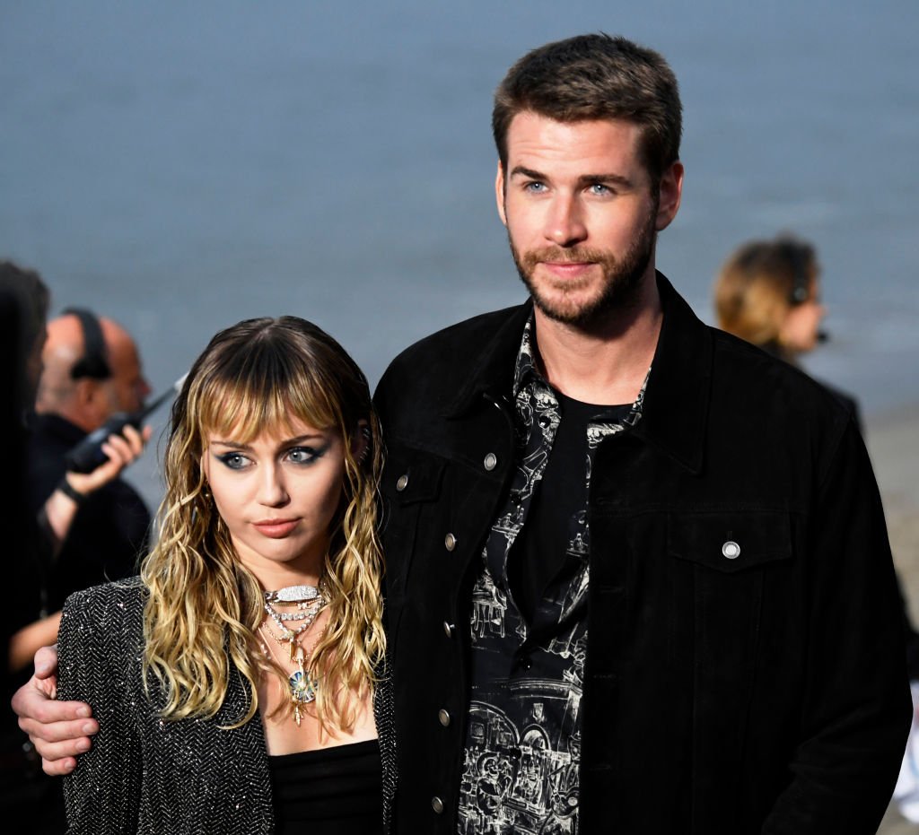 Miley Cyrus and Liam Hemsworth attend the Saint Laurent Mens Spring Summer 20 Show. | Photo: Getty Images