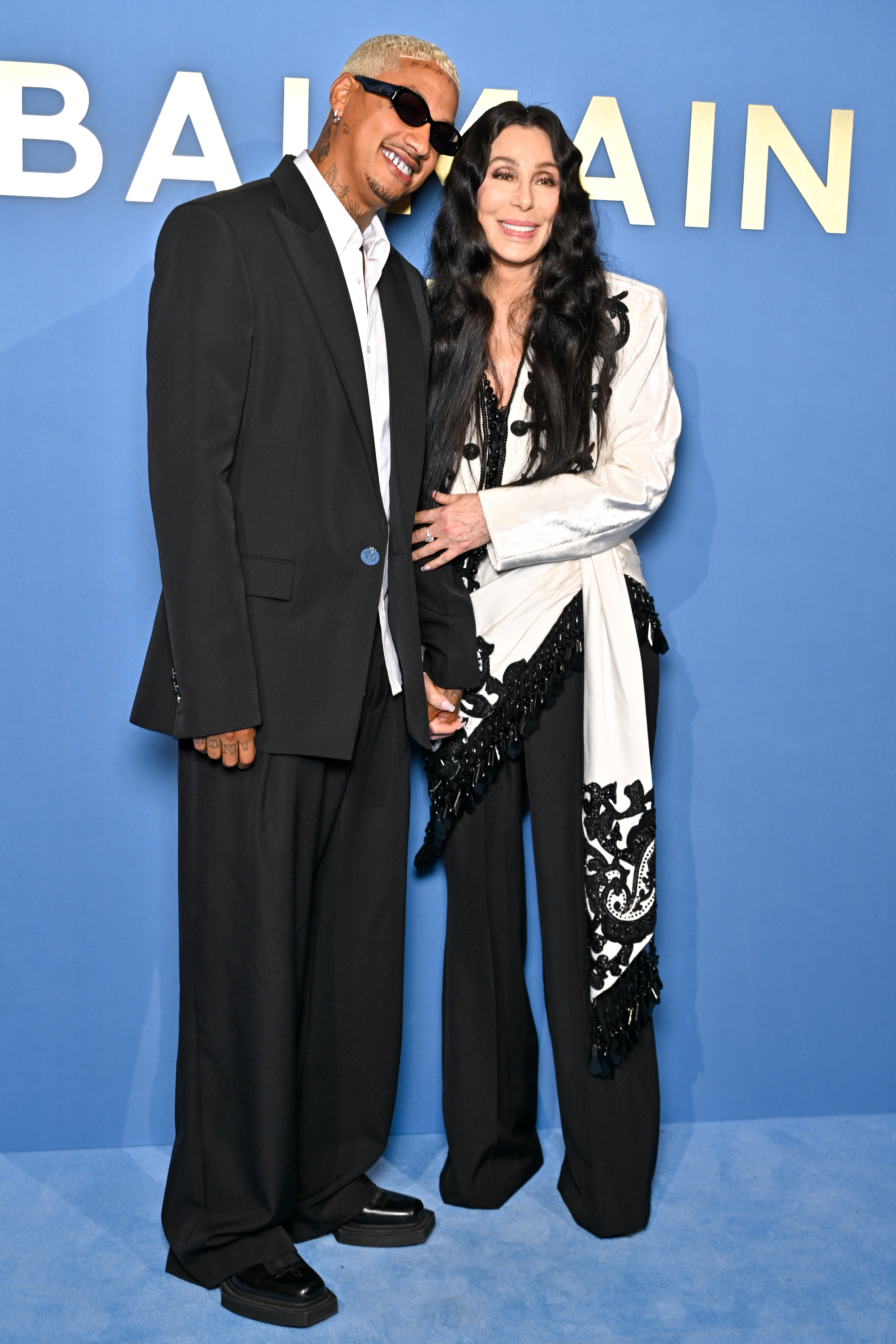 Cher and Alexander Edwards at Paris Fashion Week - Womenswear Spring/Summer 2024 | Source: Getty Images