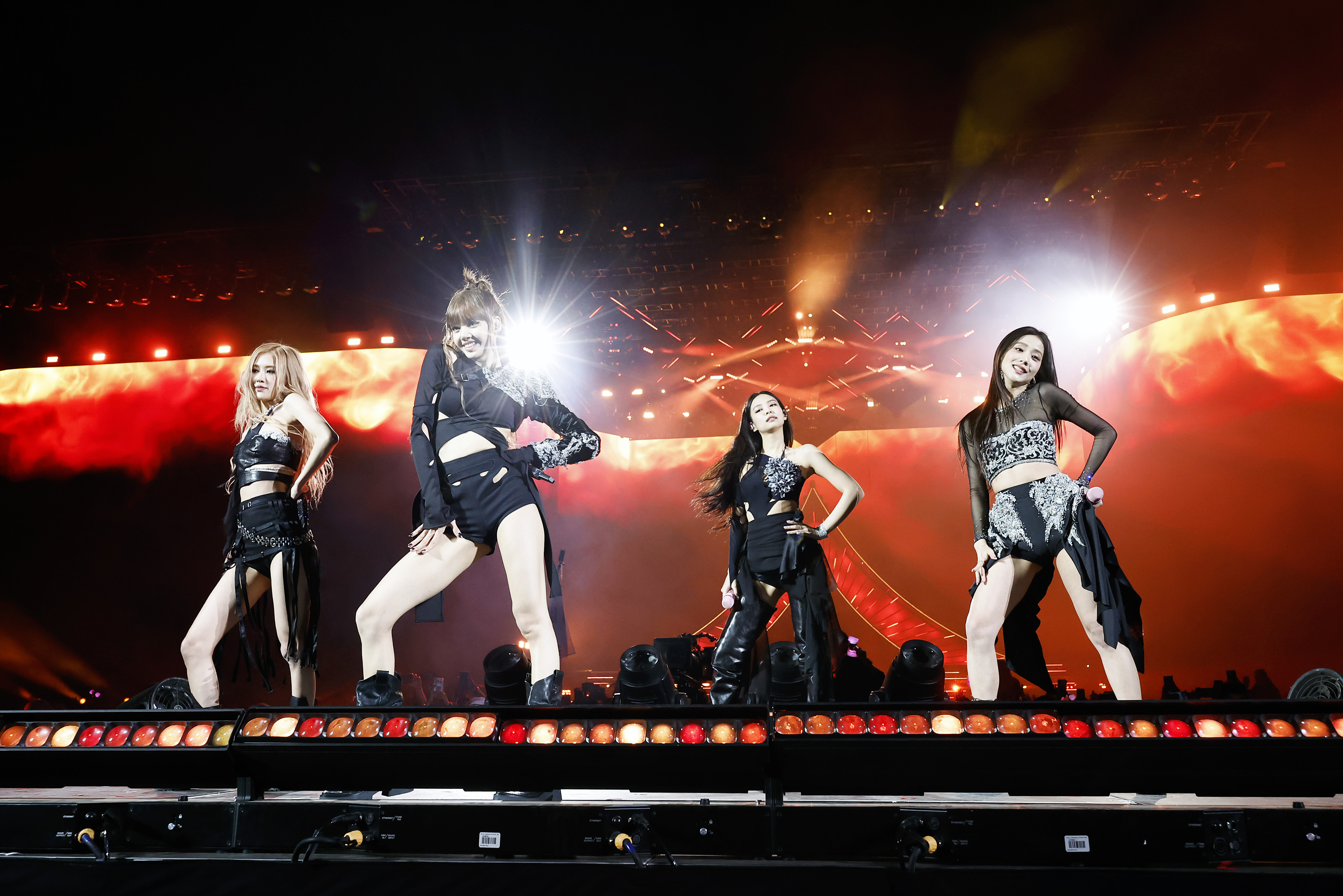 (L-R) Rosé, Lisa, Jennie, and Jisoo of BLACKPINK are pictured as they perform at the Coachella Stage during the 2023 Coachella Valley Music and Arts Festival on April 15, 2023, in Indio, California | Source: Getty Images