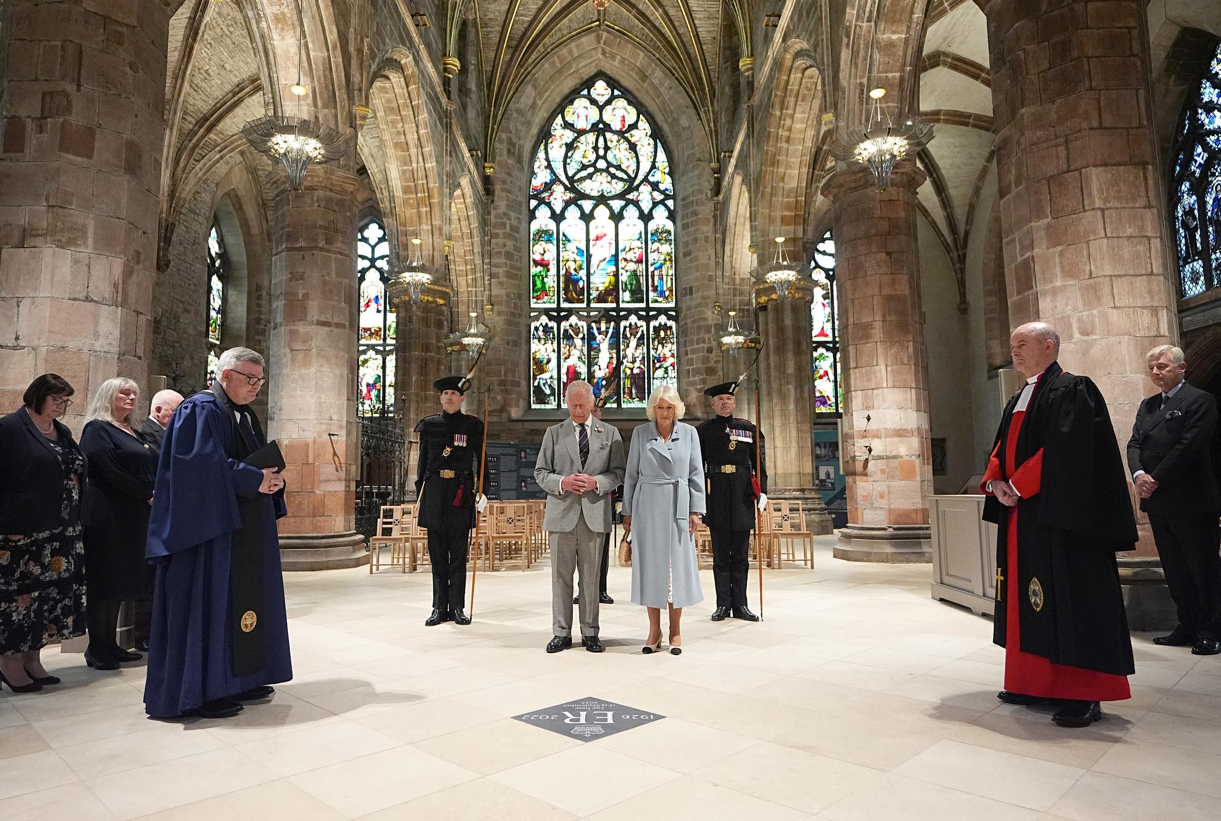 King Charles III and Queen Camila unveil a Memorial Stone for his late mother, Queen Elizabeth II, on their Majesties The King and Queen's visit to Scotland at St Giles' Cathedral in Edinburgh, on July 2, 2025 | Source: Getty Images